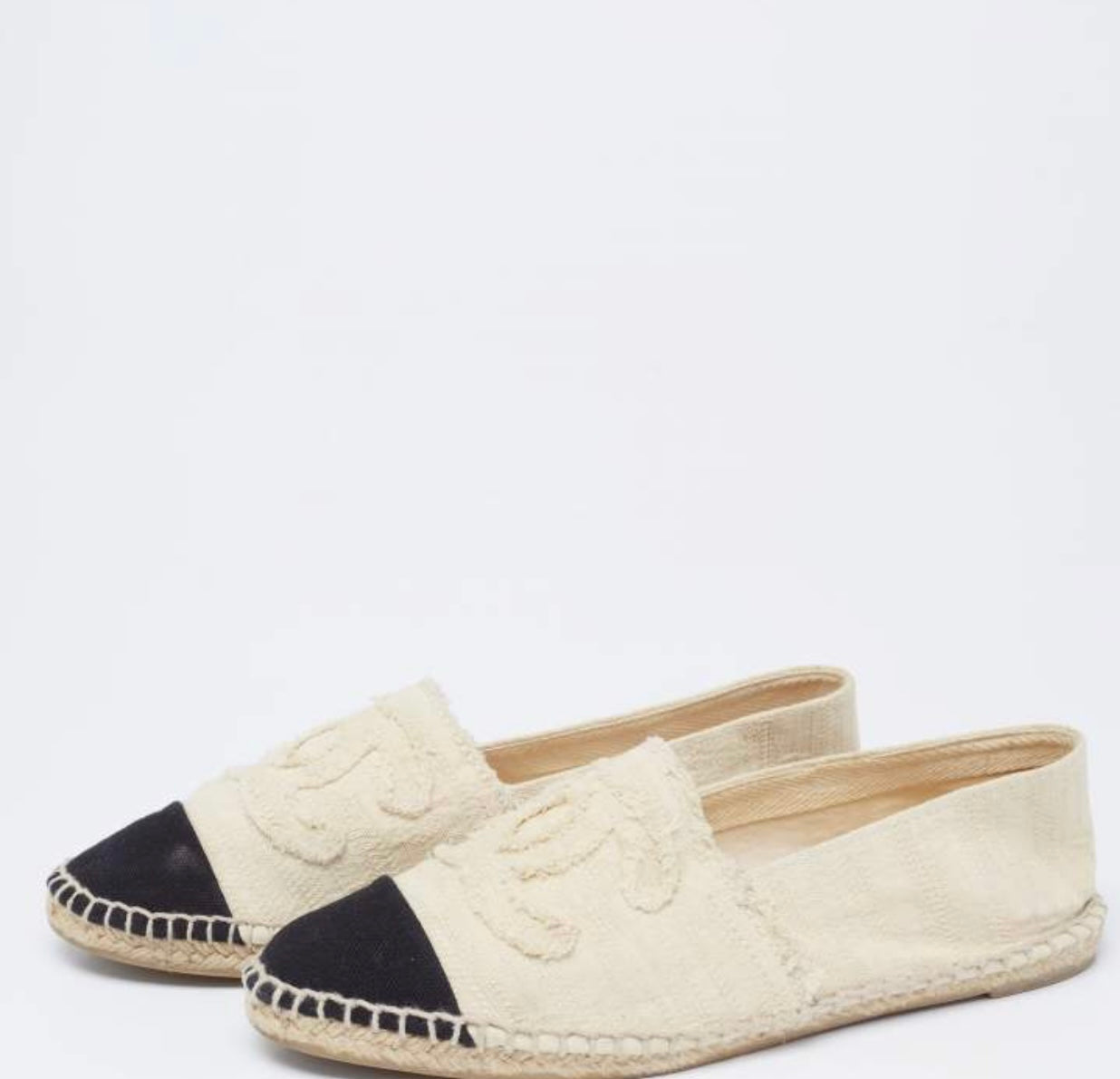 Pre-Loved Chanel™
- Off White/Black Canvas CC Cap Toe Espadrille Flats
