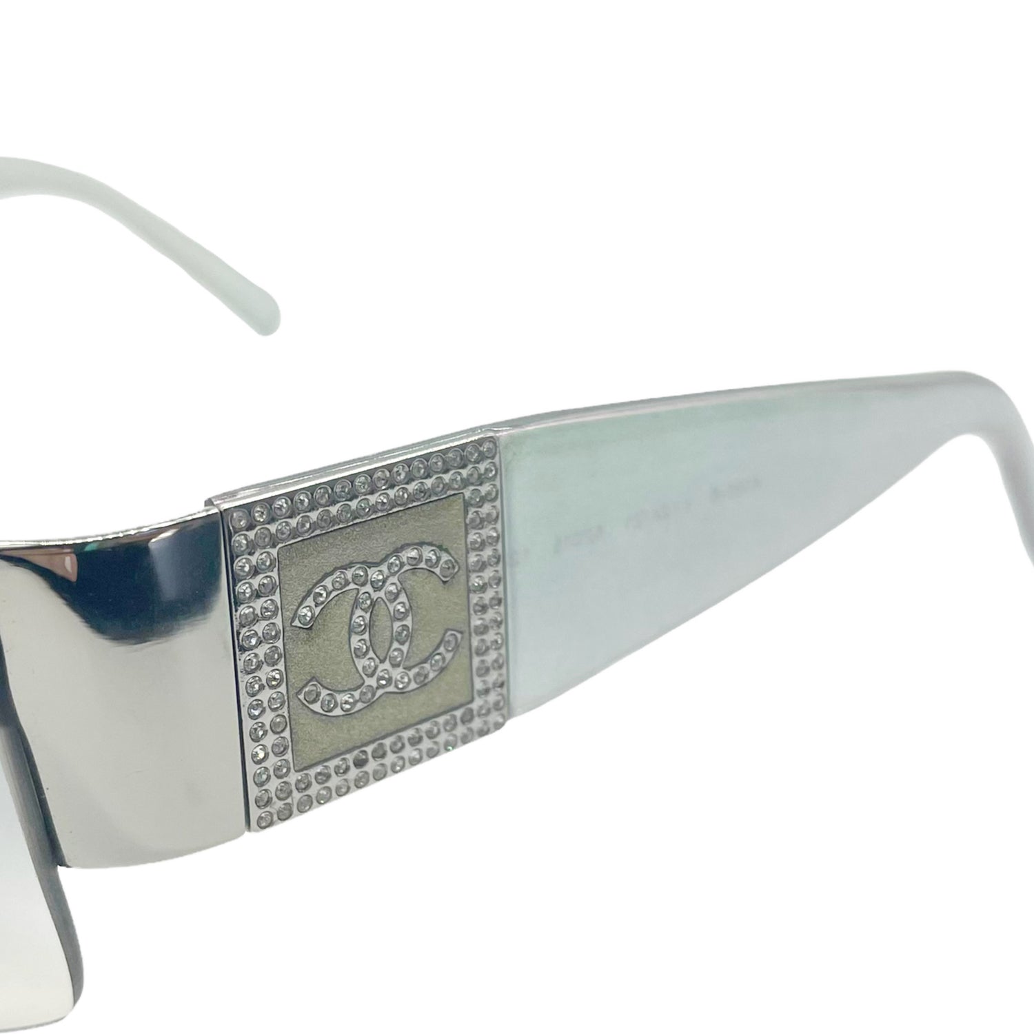 CHANEL clear lense glasses with iridescent arms and sequin logo