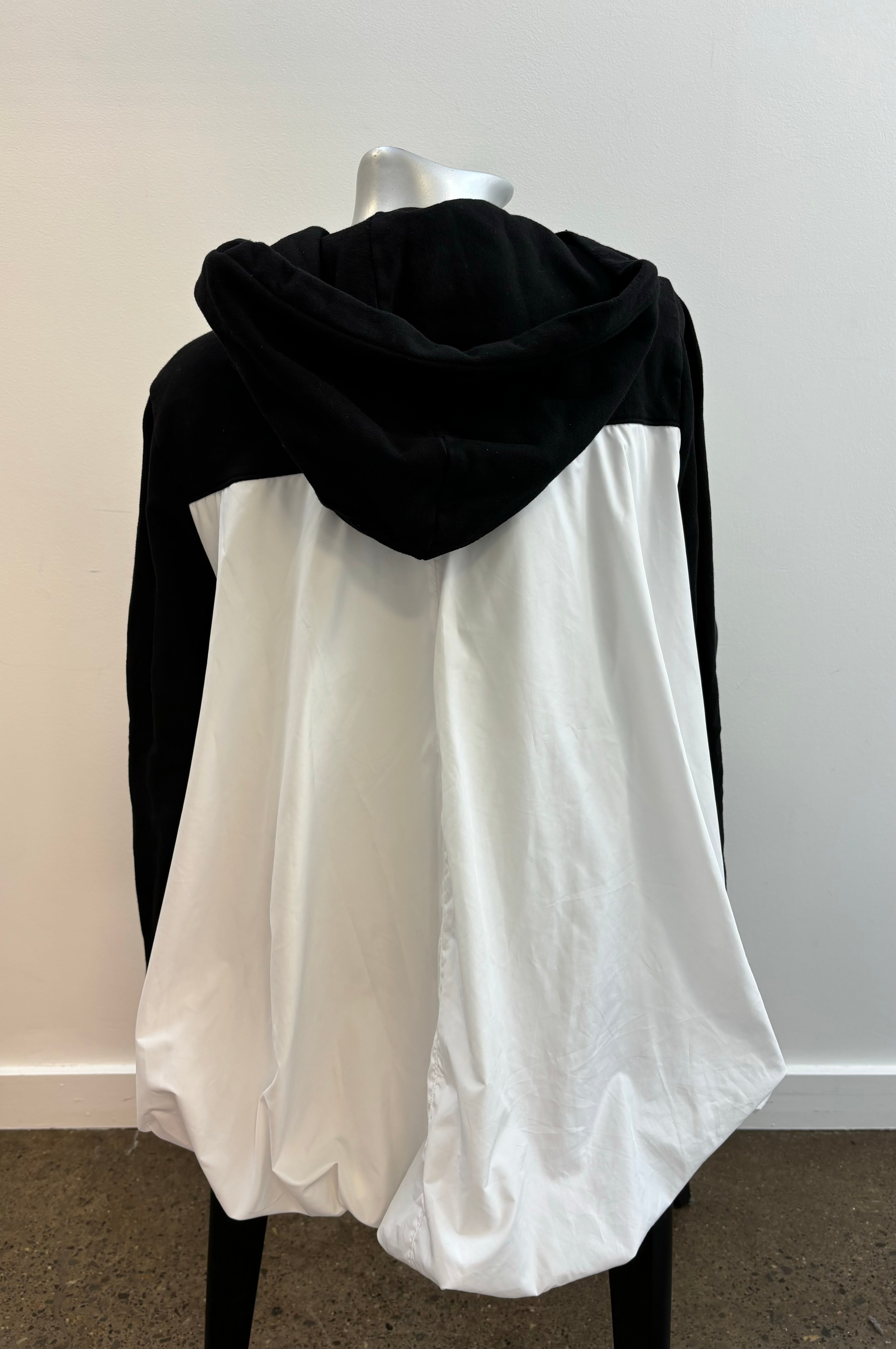 CLU black zip up hoodie with white blouse material back