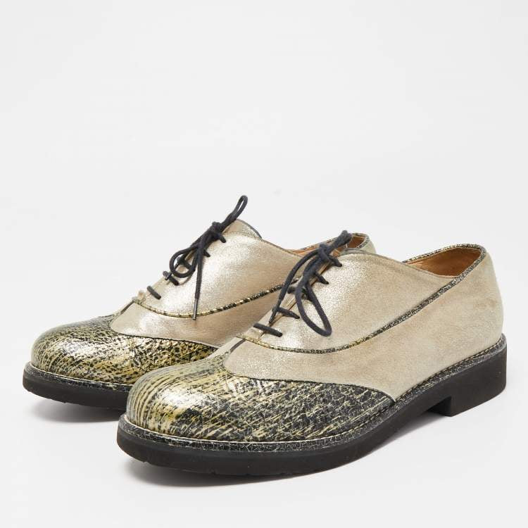 CHANEL womens dress shoe, gold with black pattern toe