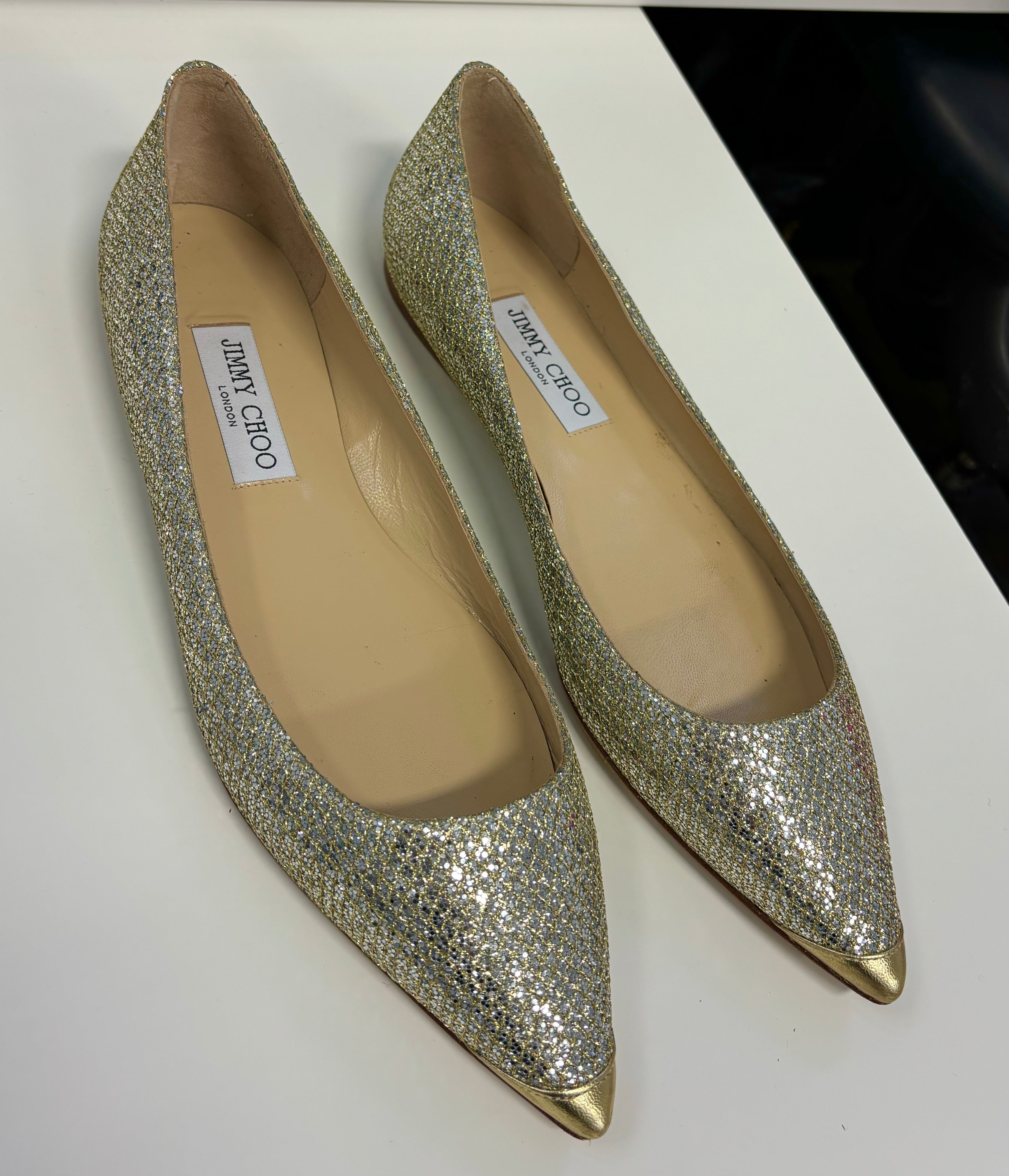 JIMMY CHOO Champagne Flats with Gold Toe Cap