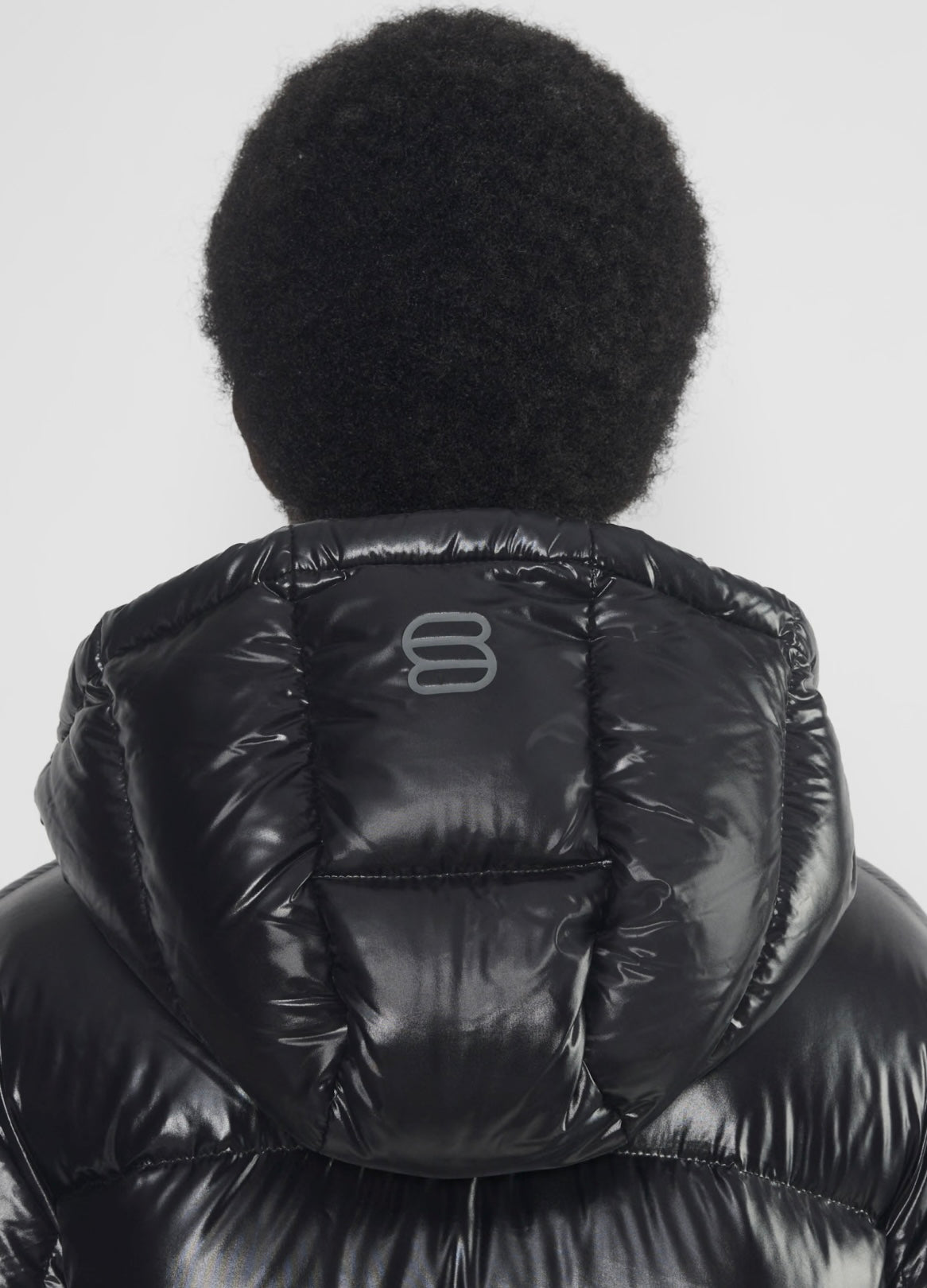 The Super Puff -
The Super Puff Long hi-gloss Jacket
