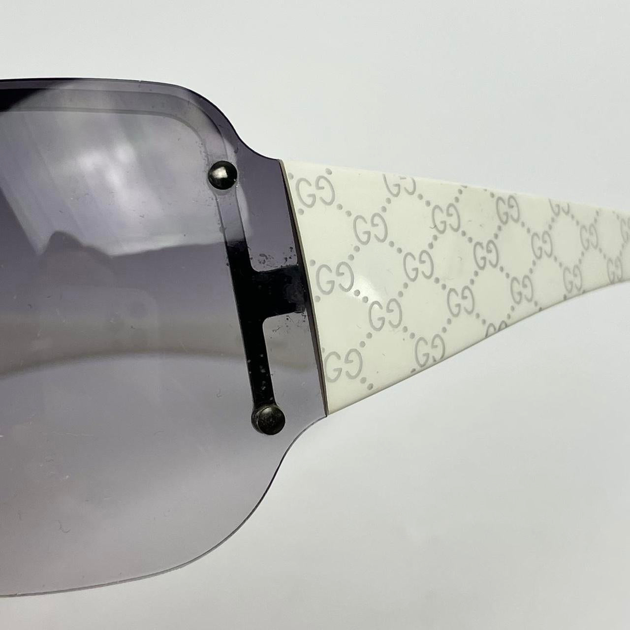 GUCCI sunglasses, no rim, gradient black to clear lense, white arms with GG logo, with case