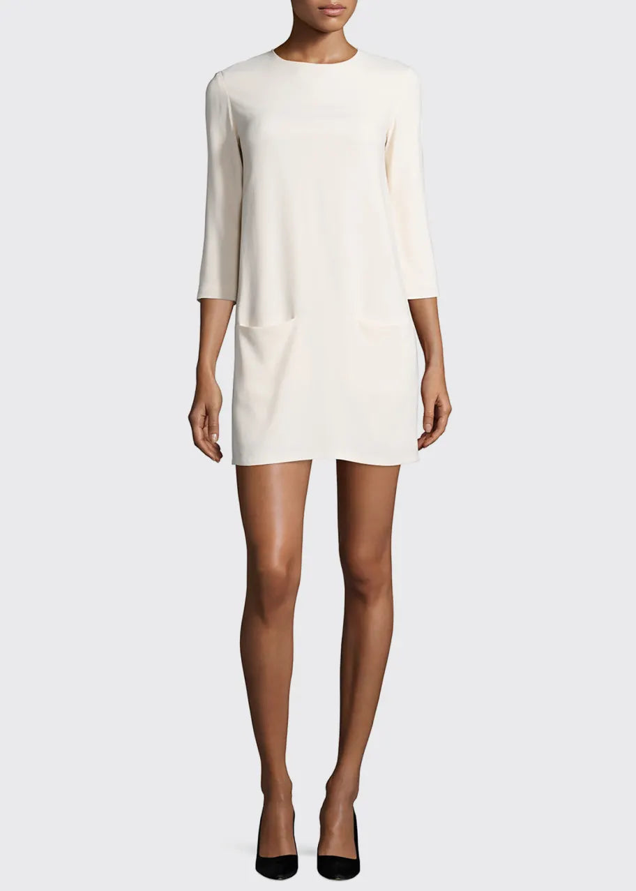 The Row cream midi dress with two front pockets