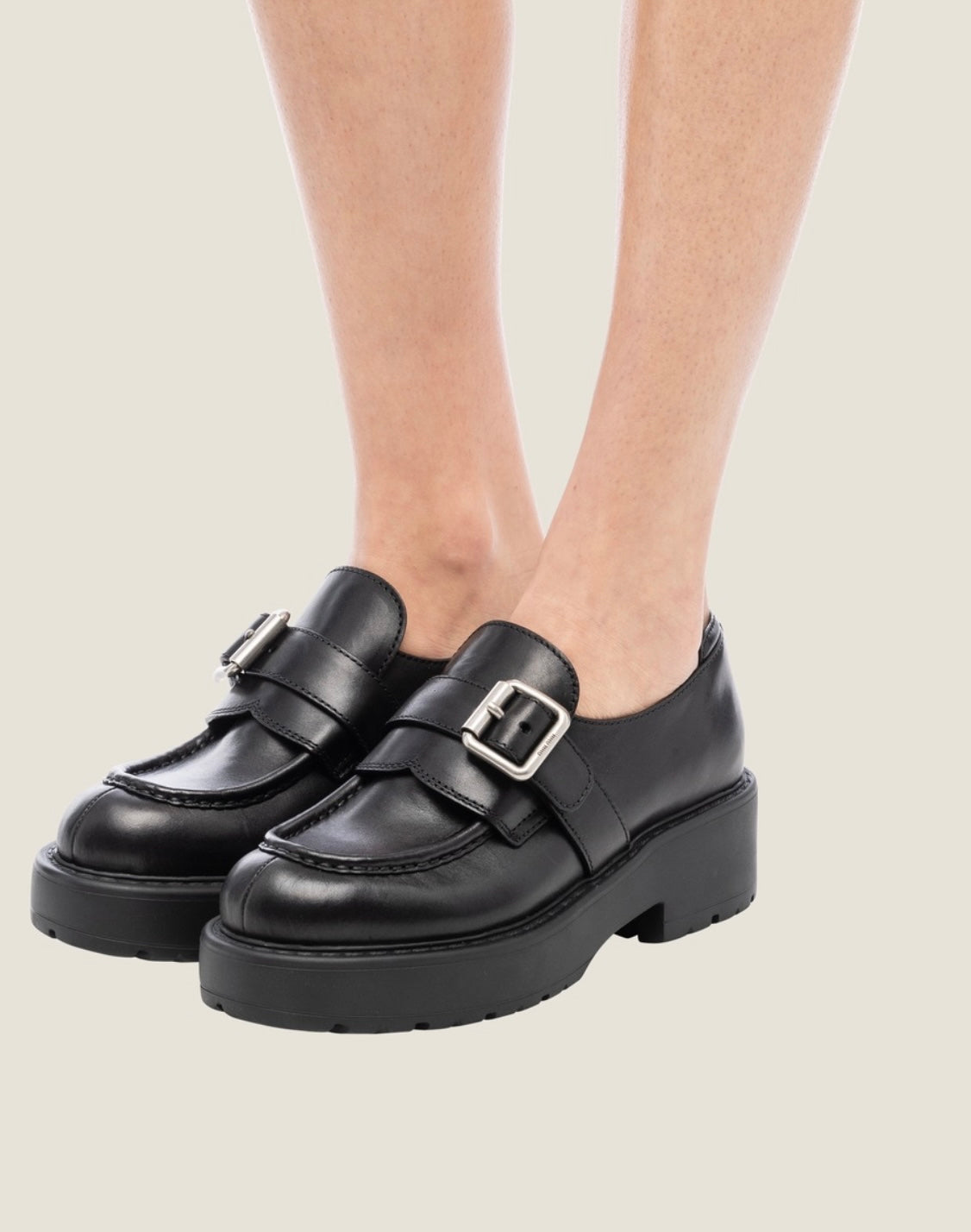 MIU MIU
Black Leather Buckle Loafers
