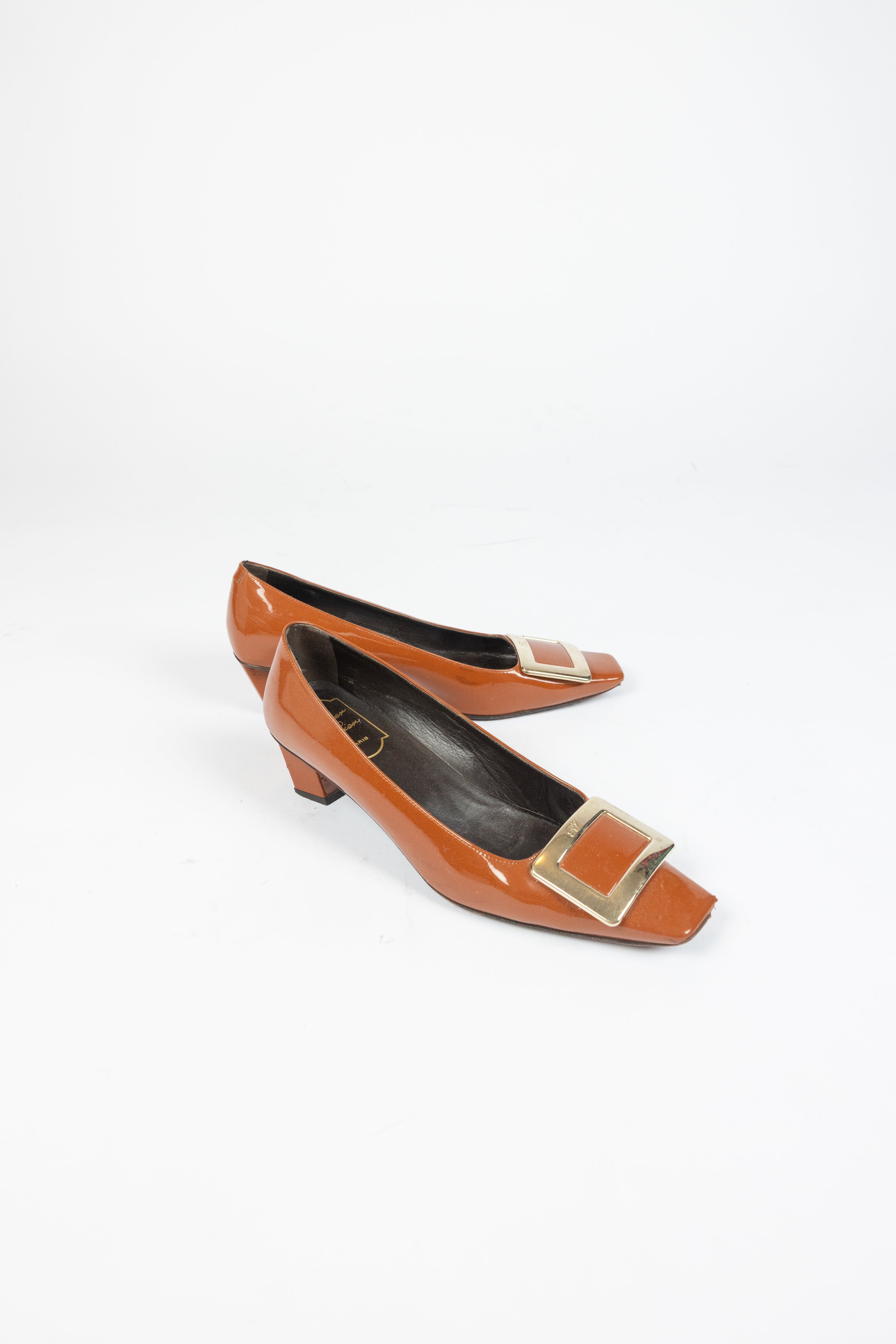 Roger Vivier Metal Buckle Pumps in Patent Leather