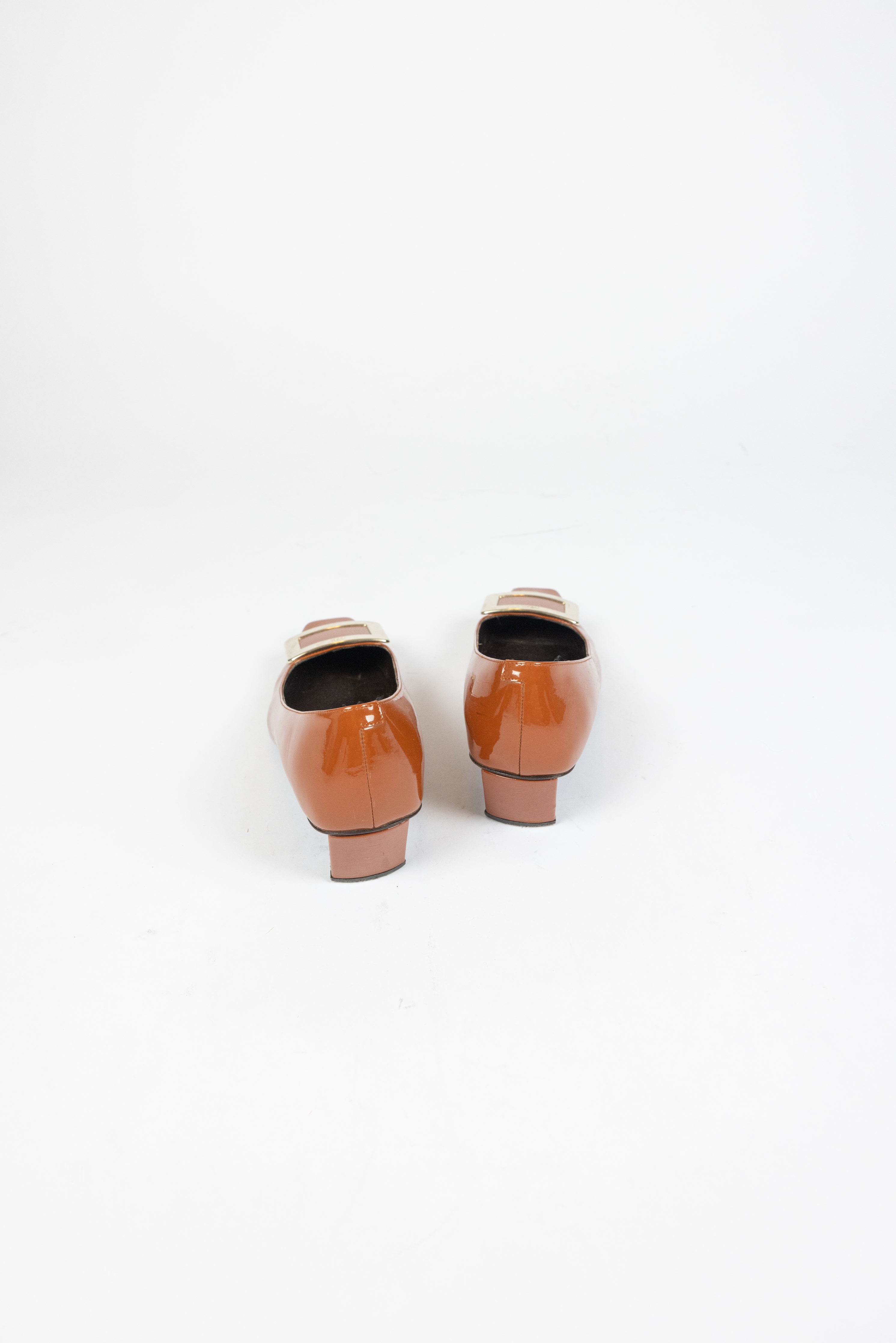 Roger Vivier Metal Buckle Pumps in Patent Leather