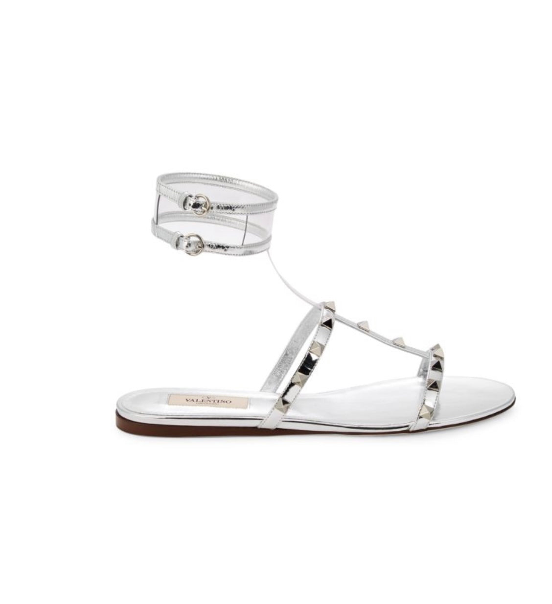 VALENTINO GARAVANI
Rockstud Metallic Leather & PVC T-Strap Sandals