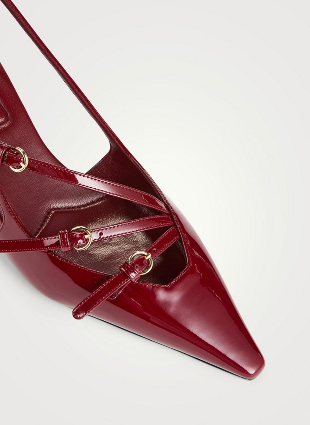 MIU MIU
Patent Leather Slingback Pumps