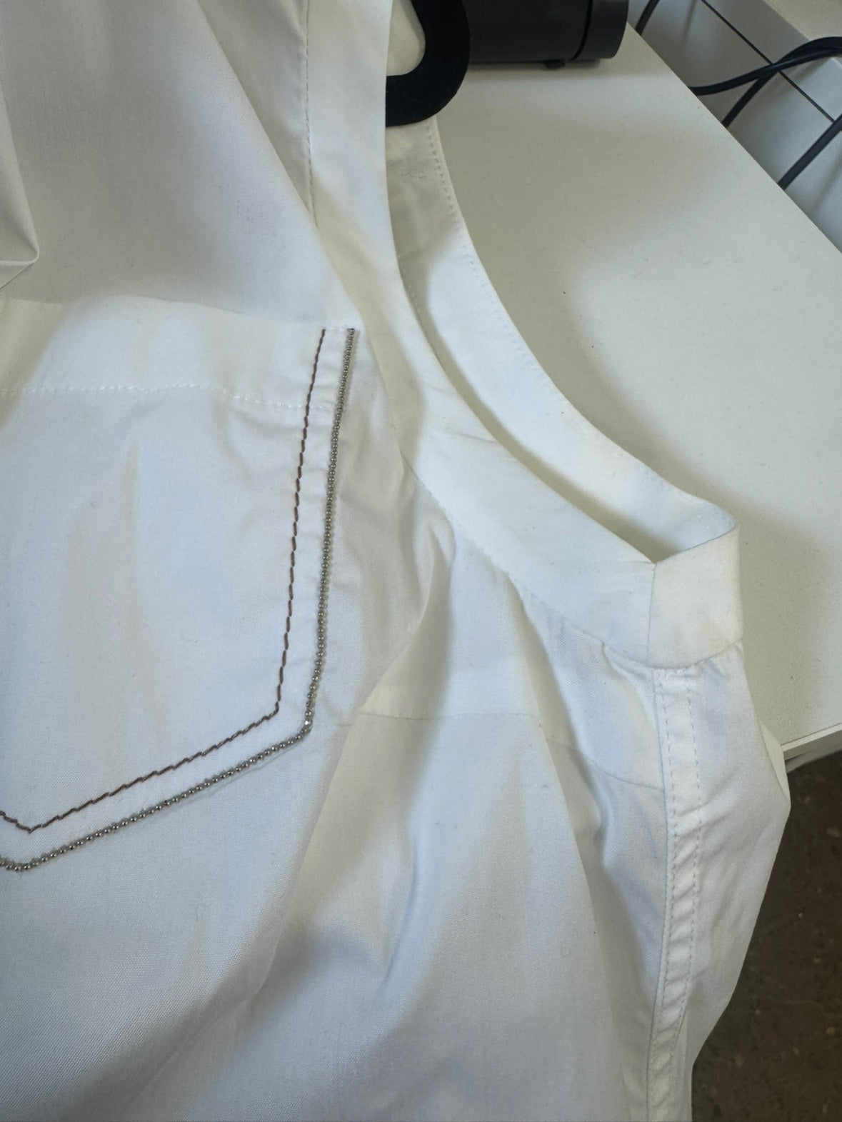BRUNELLO CUCINELLI sleeveless botton up with monili pocket