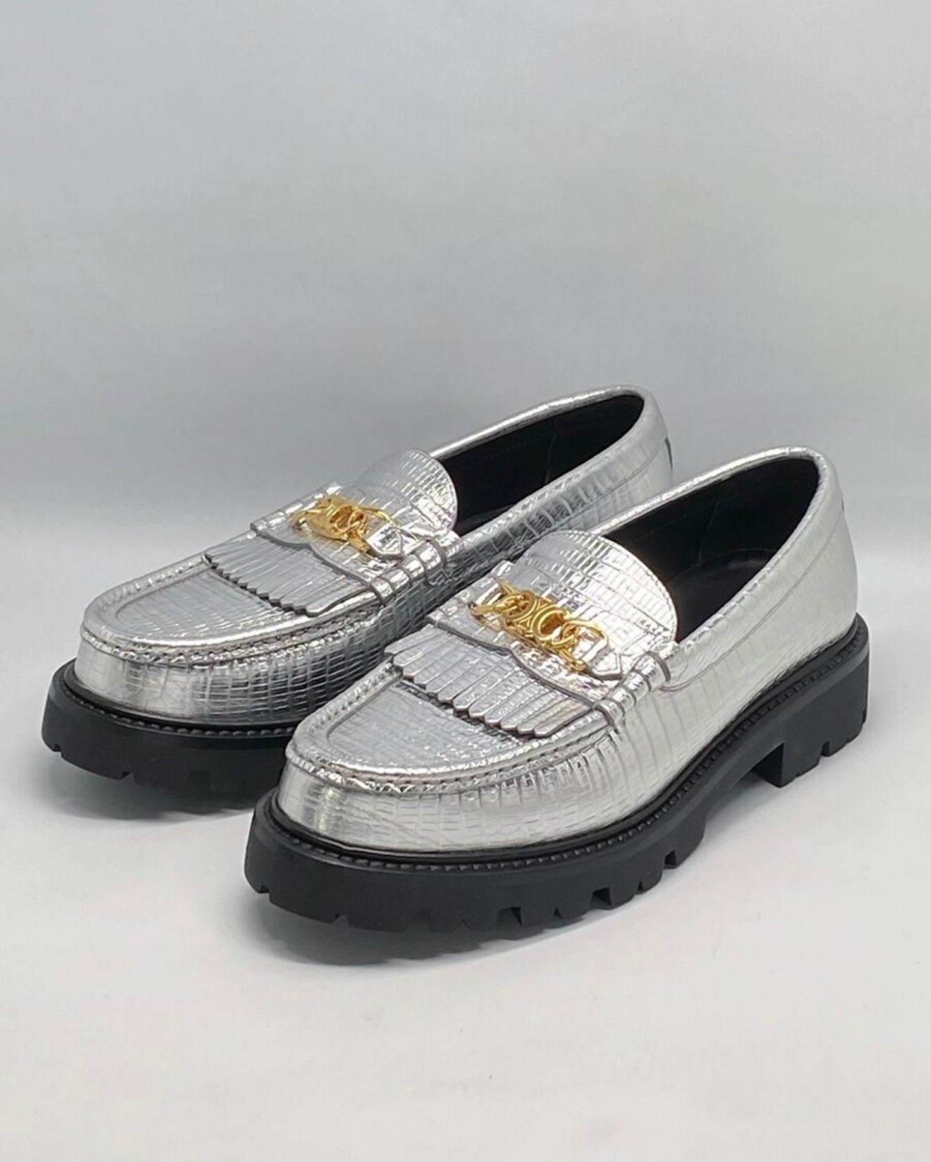 Celine
Margaret Triomphe Silver Loafers