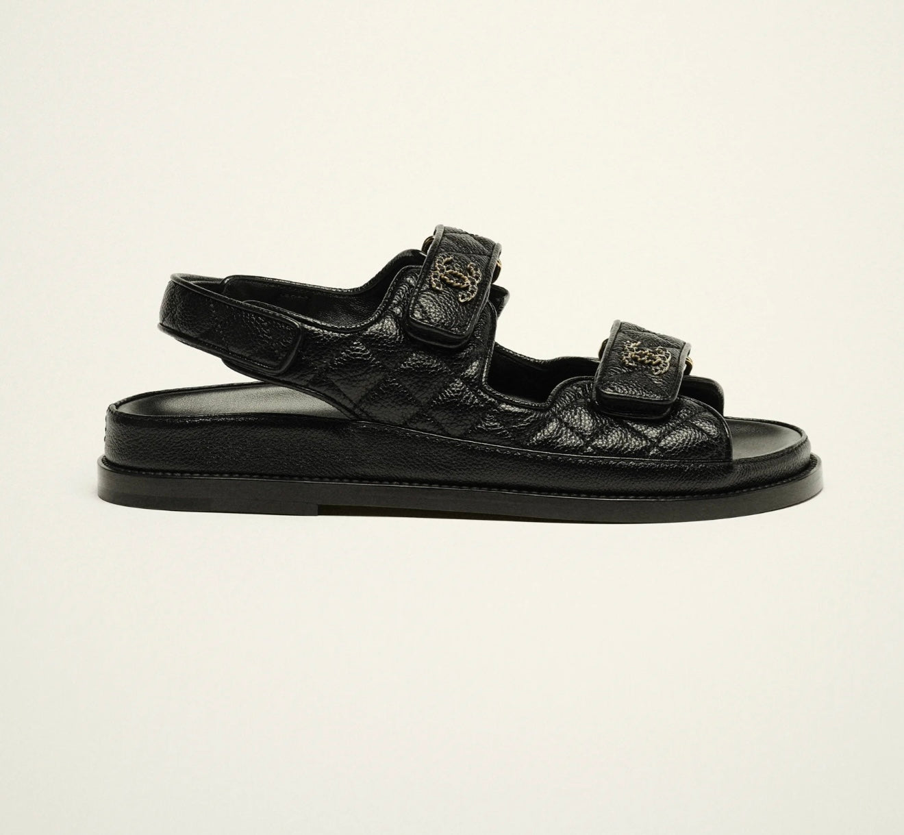CHANEL SHINY LAMBSKIN QUILTED LEATHER SANDALS IN BLACK