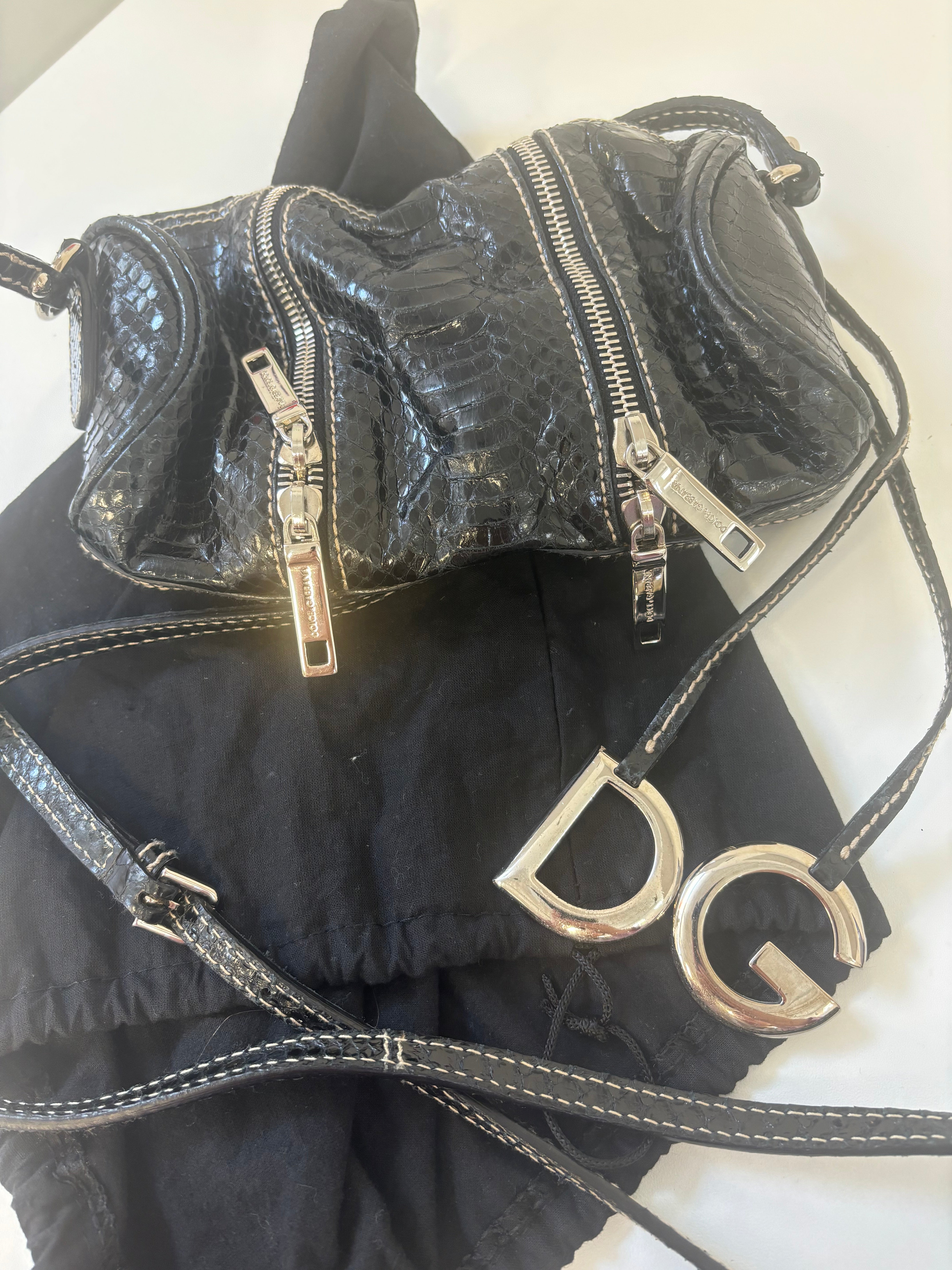 DOLCE & GABBANA small black snakeskin purse with silver zippers, w dust bag