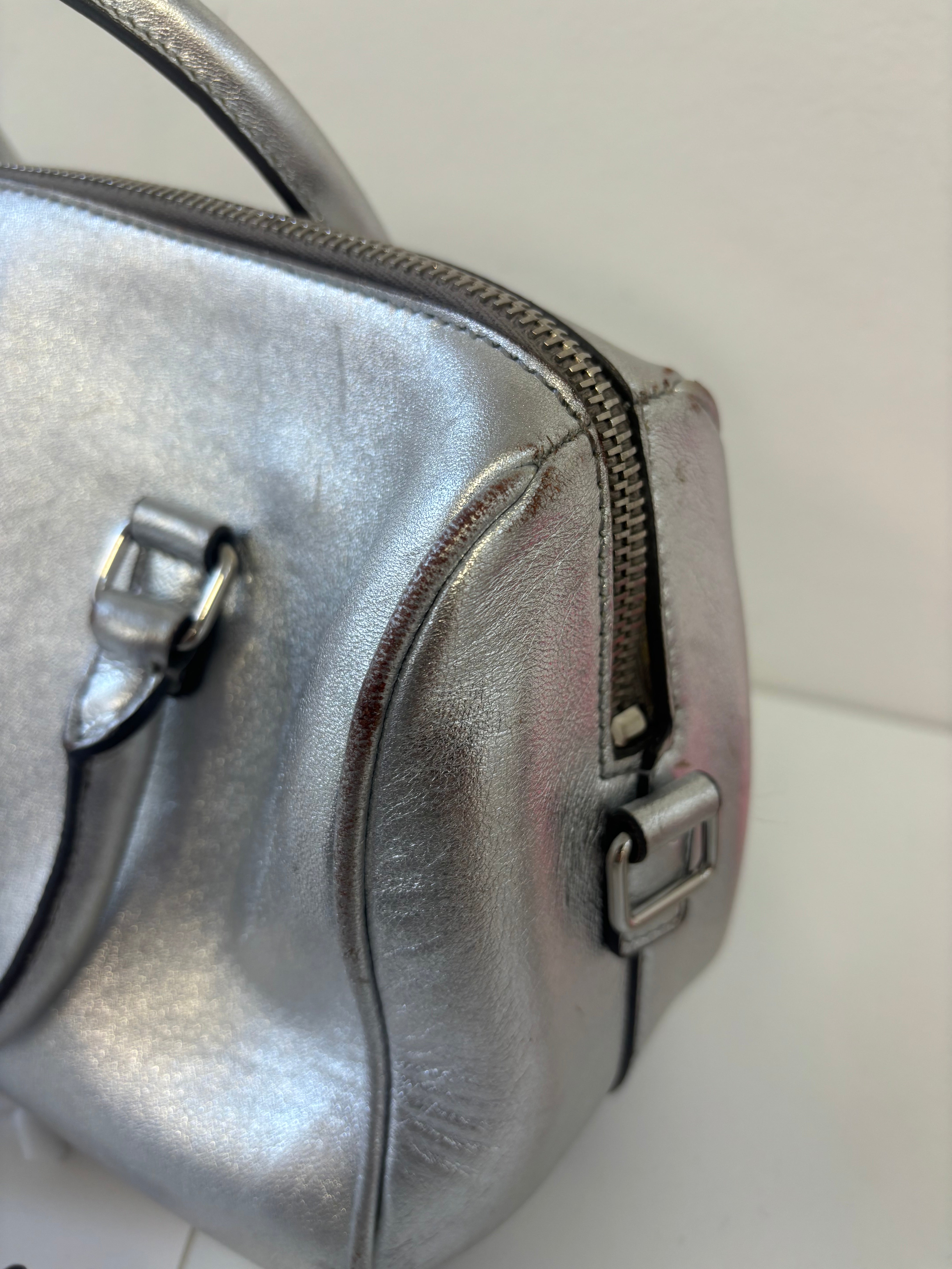 SAINT LAURENT baby duffle bag, silver purse with crossbody strap