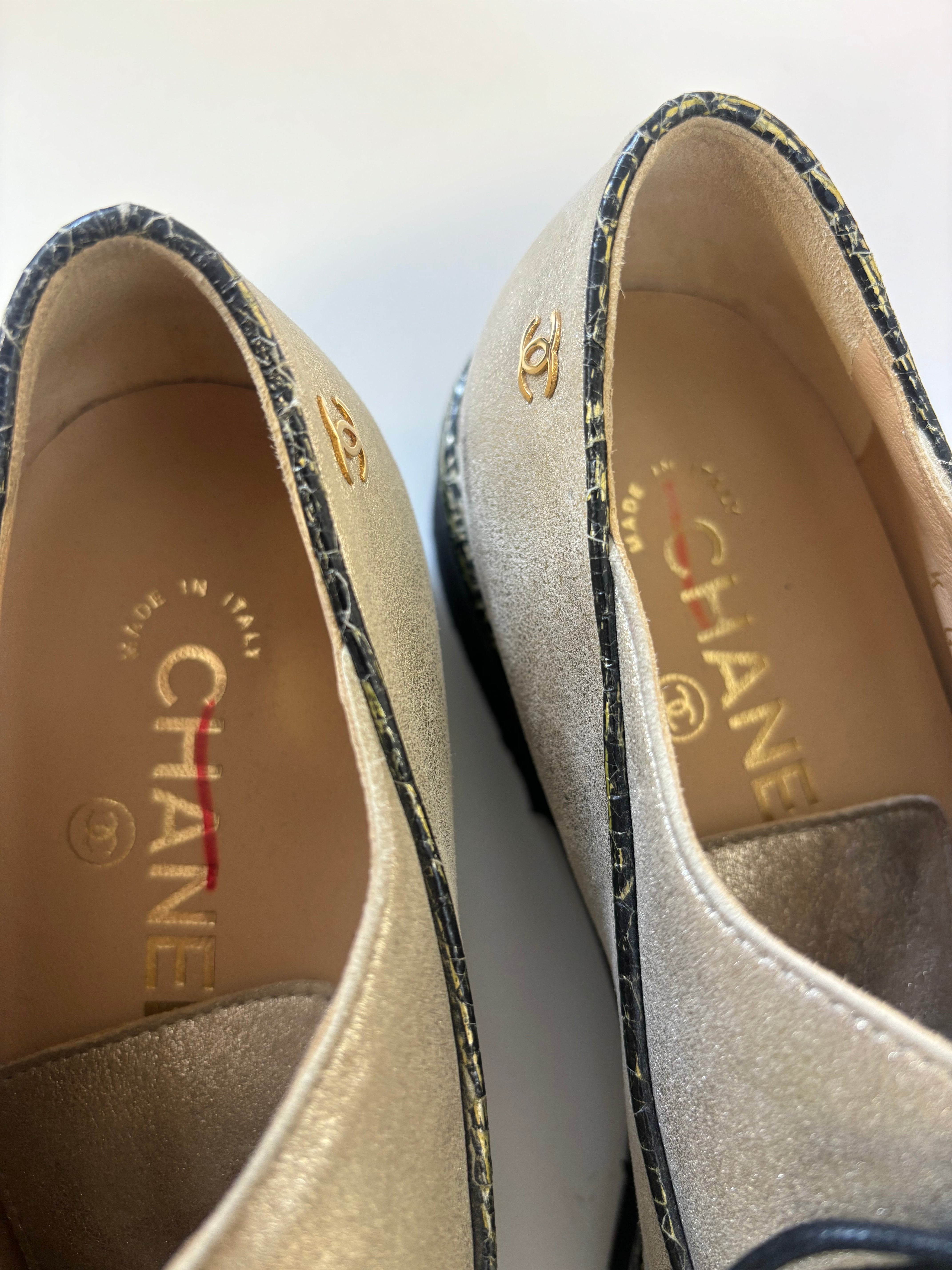 CHANEL womens dress shoe, gold with black pattern toe