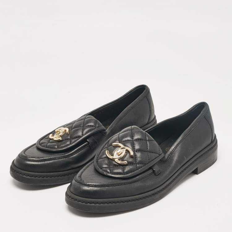 CHANEL black quilted lamb leather turn-lock CC logo loafers