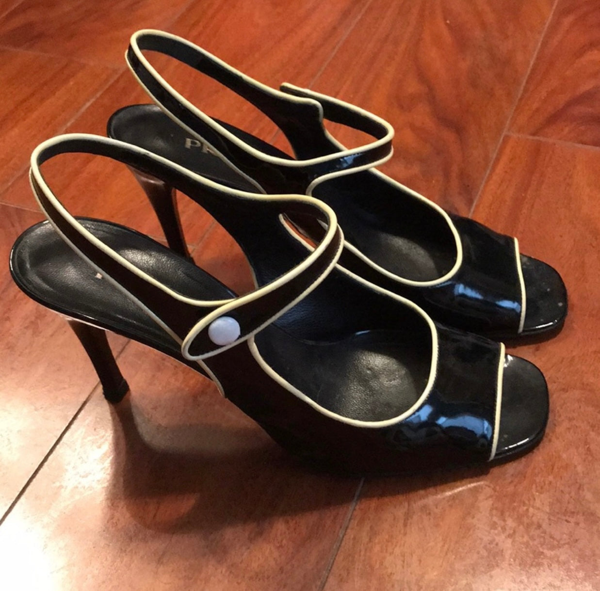 Pre-Loved Prada- Black Patent Leather with white trim peep toe heels