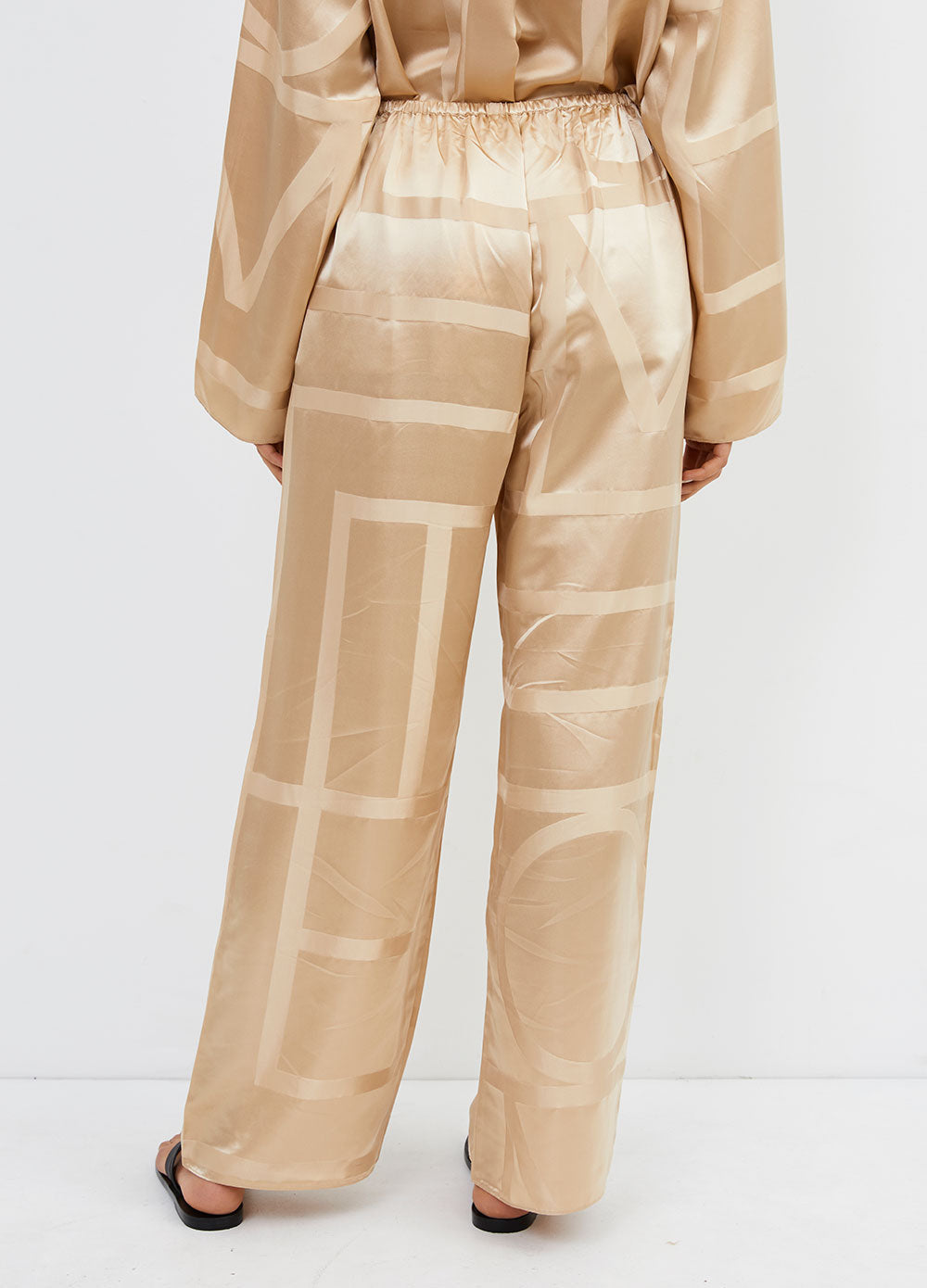 TOTEME monogram silk lounge pants