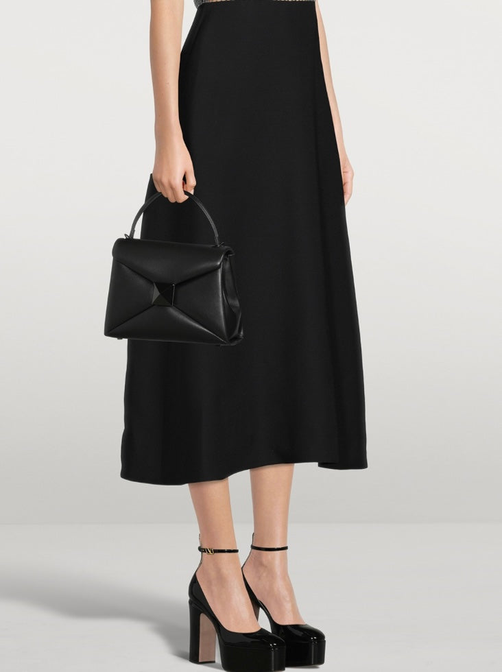 VALENTINO GARAVANI
Tan-Go Patent Leather Platform Pumps