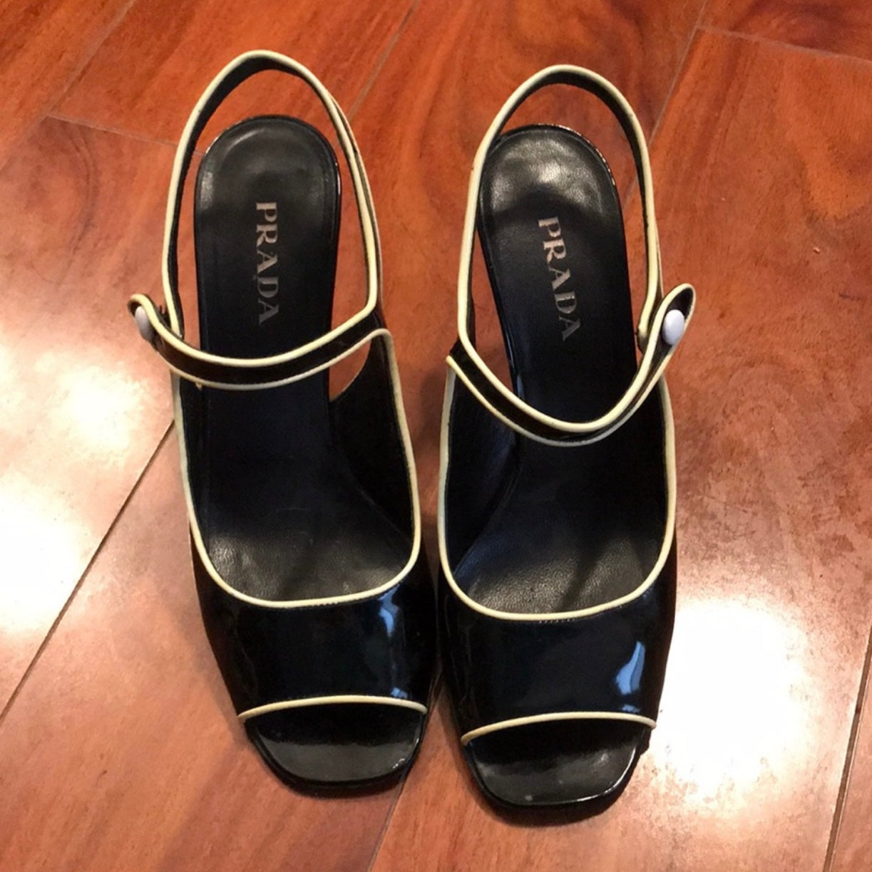Pre-Loved Prada- Black Patent Leather with white trim peep toe heels