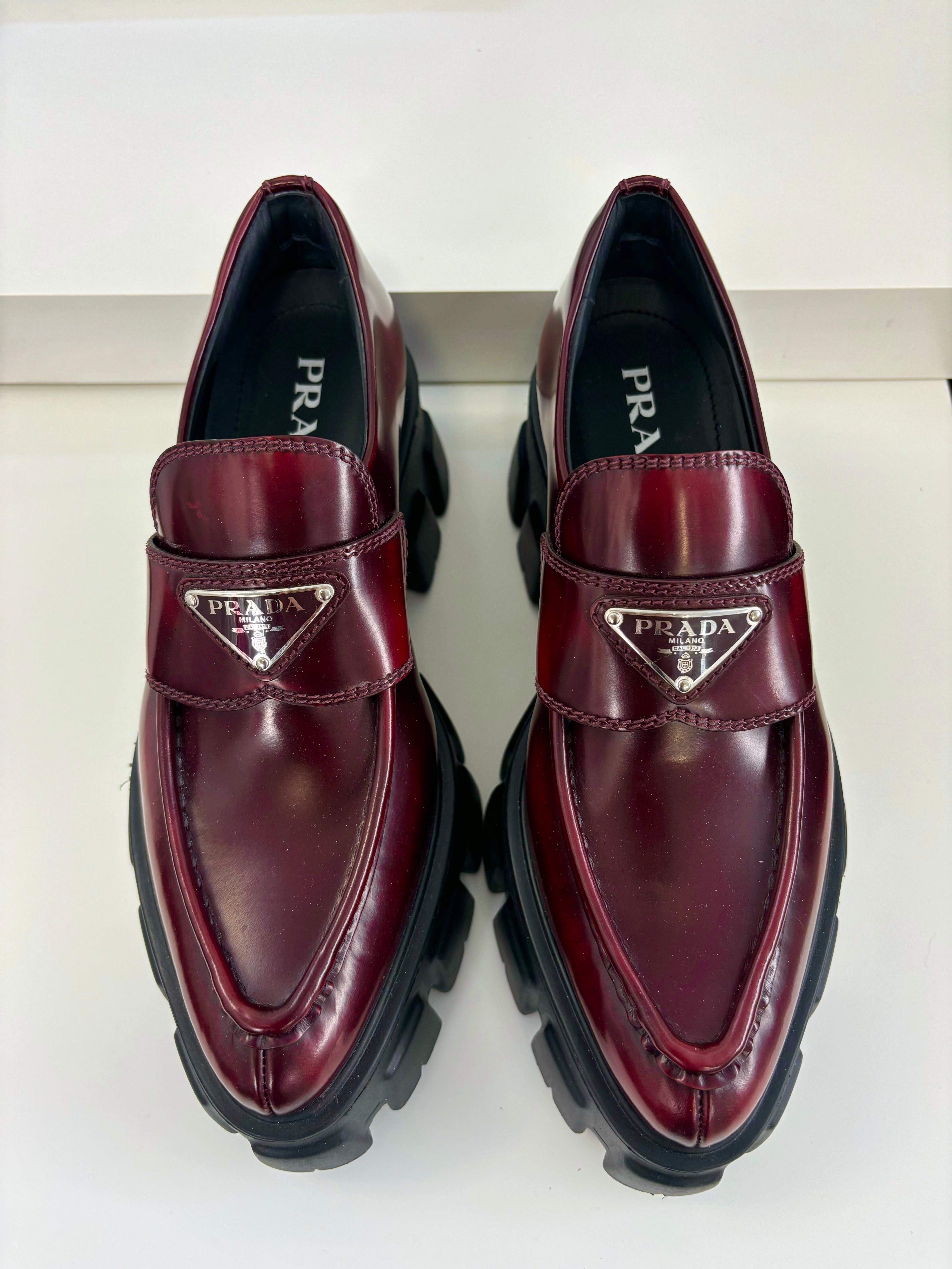 PRADA red chunky pointed toe loafers