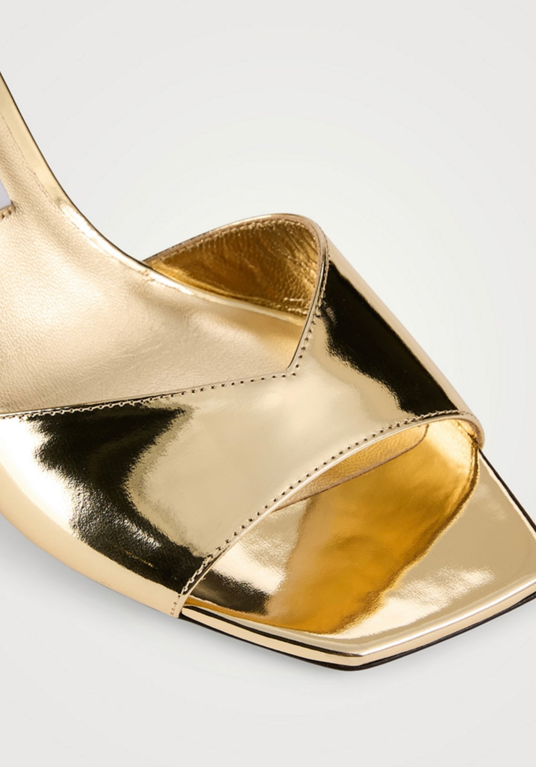 JIMMY CHOO
Skye Metallic Leather Mules
