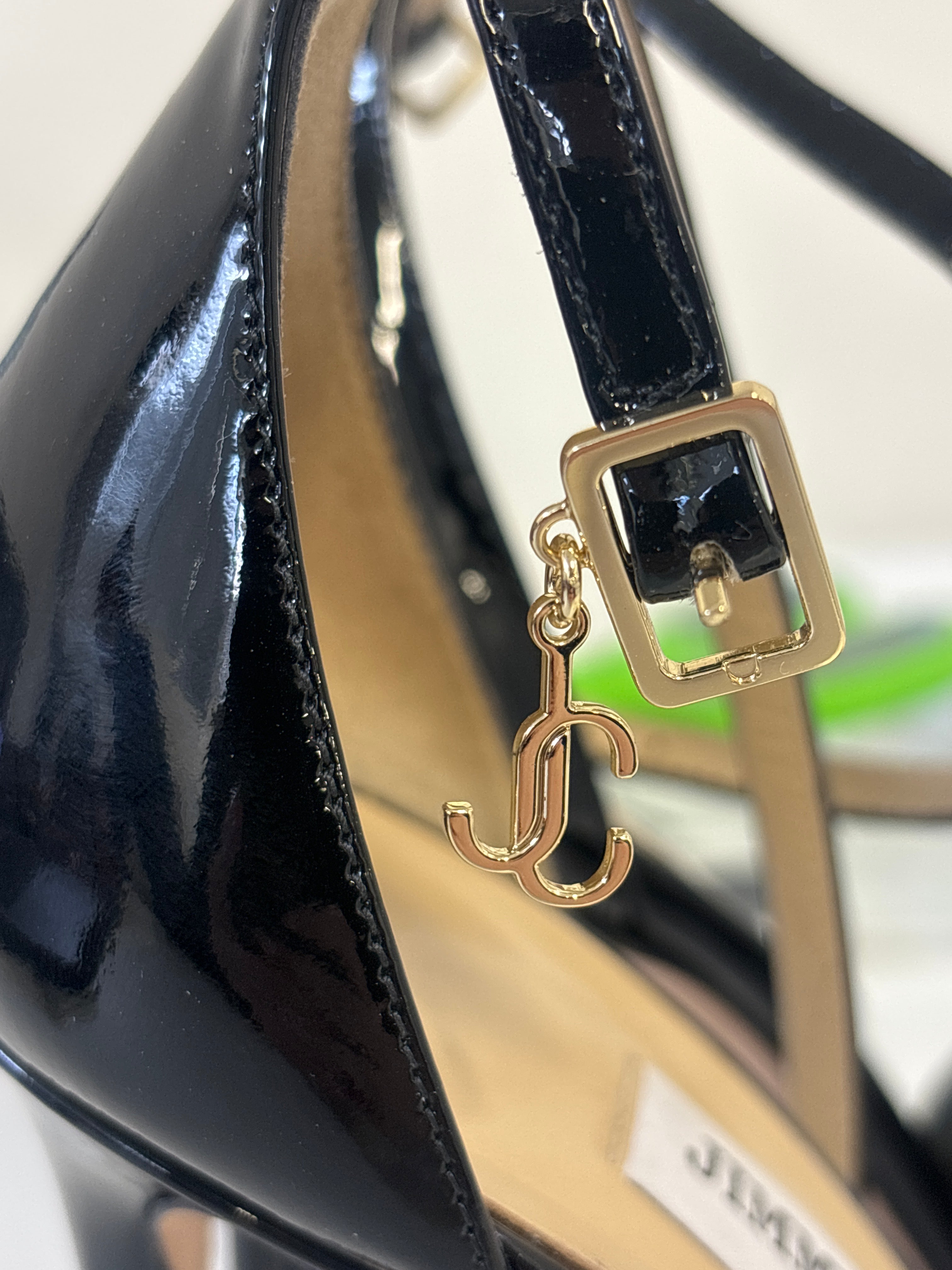 JIMMY CHOO black closed toe heel with ankle strap