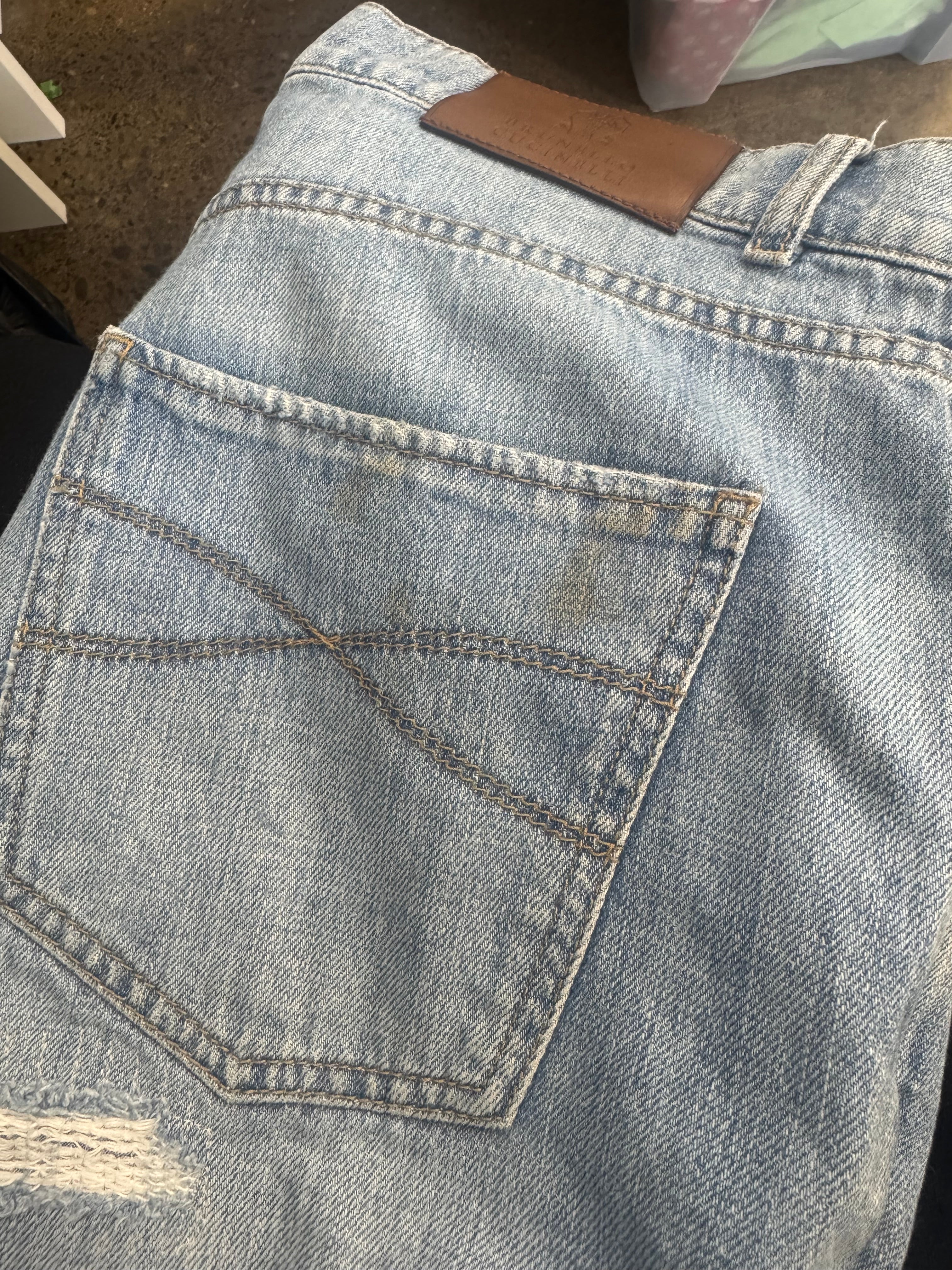 BRUNELLO CUCINELLI skinny fit distressed light blue jeans (mens)