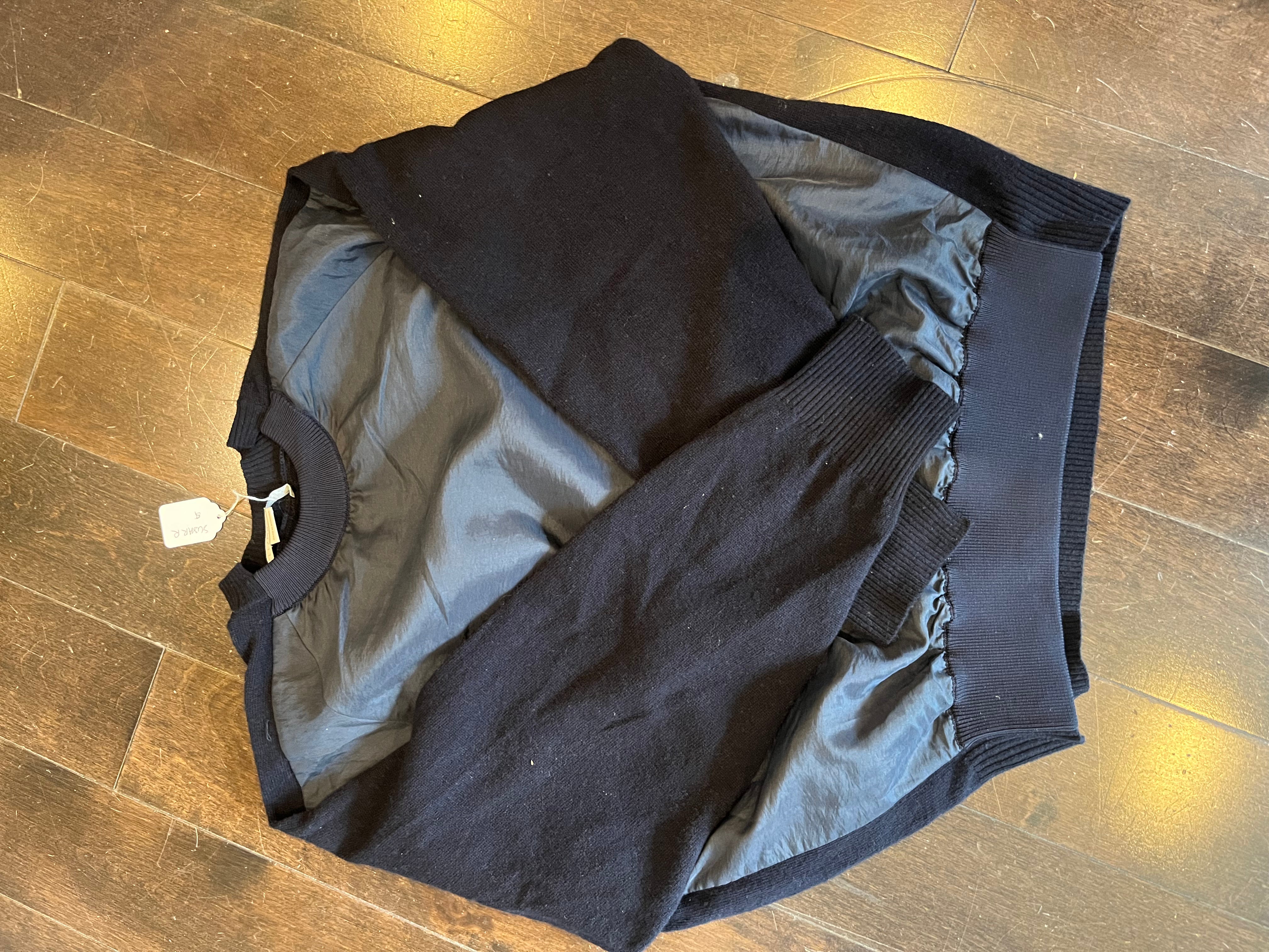 STELLA MCCARTNEY black longsleeve wool top with navy nylon front