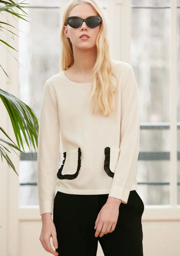 CLAUDIE PIERLOT cream knit with black ruffle pockets