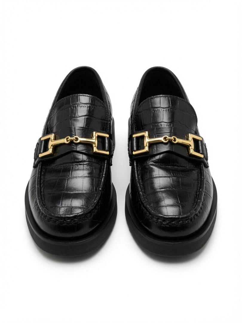 ARKET black loafer with gold accent/horsebit