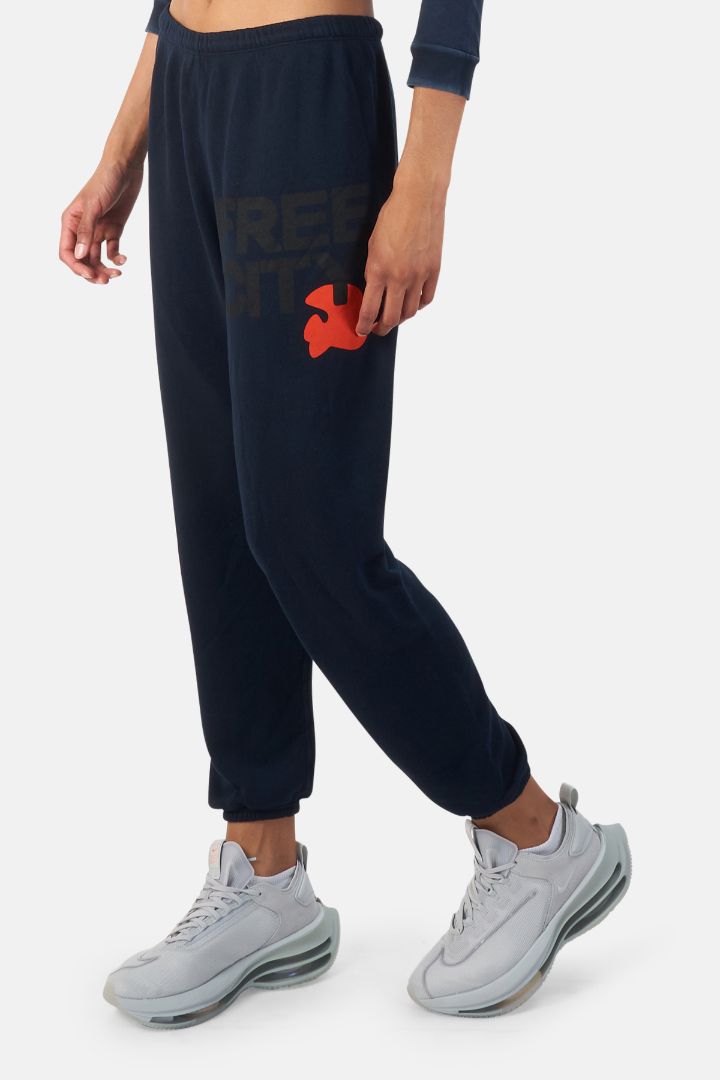 FREE CITY cropped navy sweatpants with orange bird, narrow leg and very small