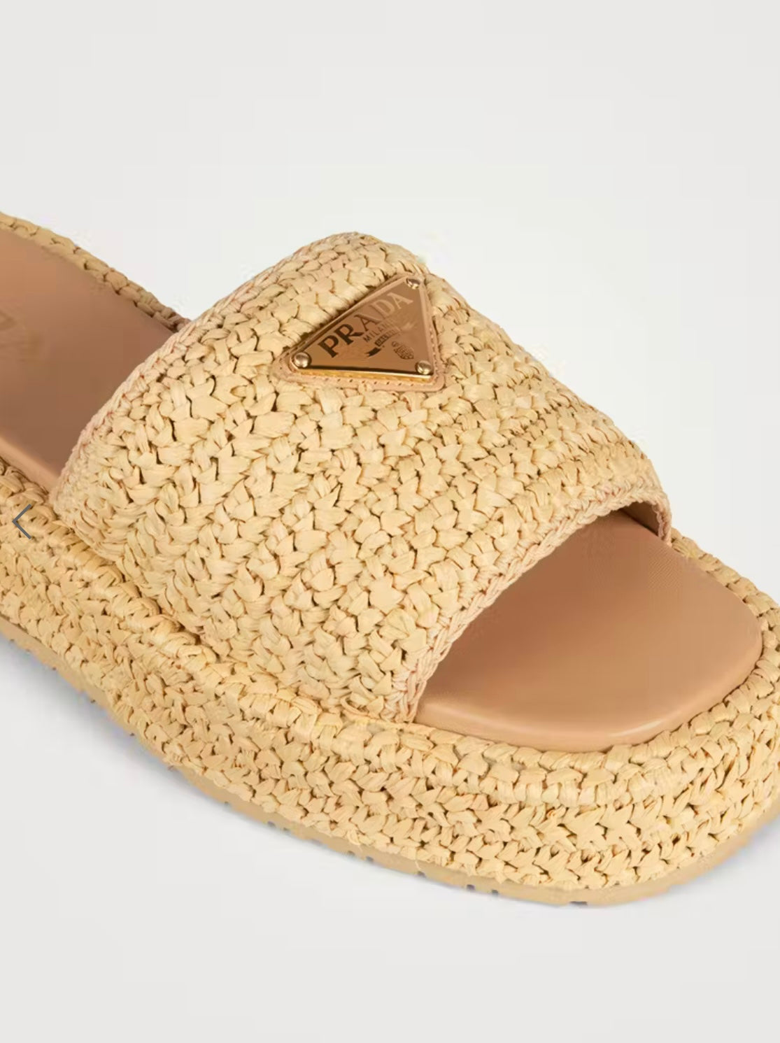 PRE-LOVED PRADA
Raffia Flatform Slide Sandals