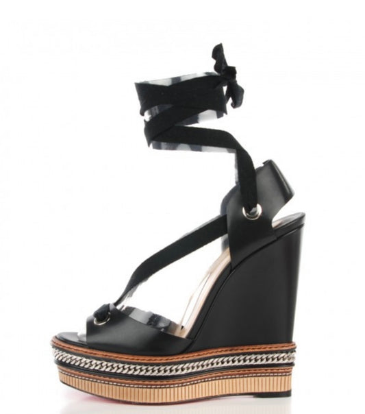 CHRISTIAN LOUBOUTIN
Shiny Calfskin Tribuli 140 Wedge