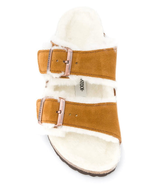 BIRKENSTOCK tan shearling clogs