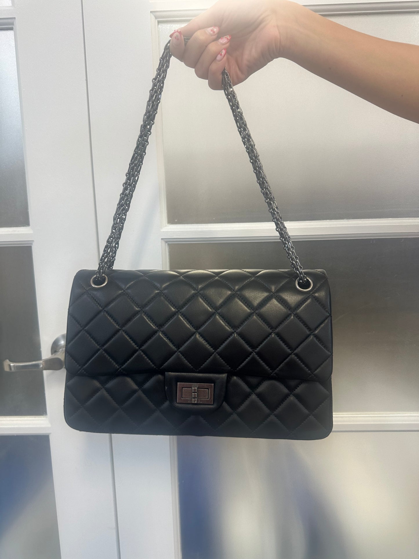 Pre-loved CHANEL - BLACK REISSUE 2.55 CLASSIC DOUBLE FLAP BAG MEDIUM