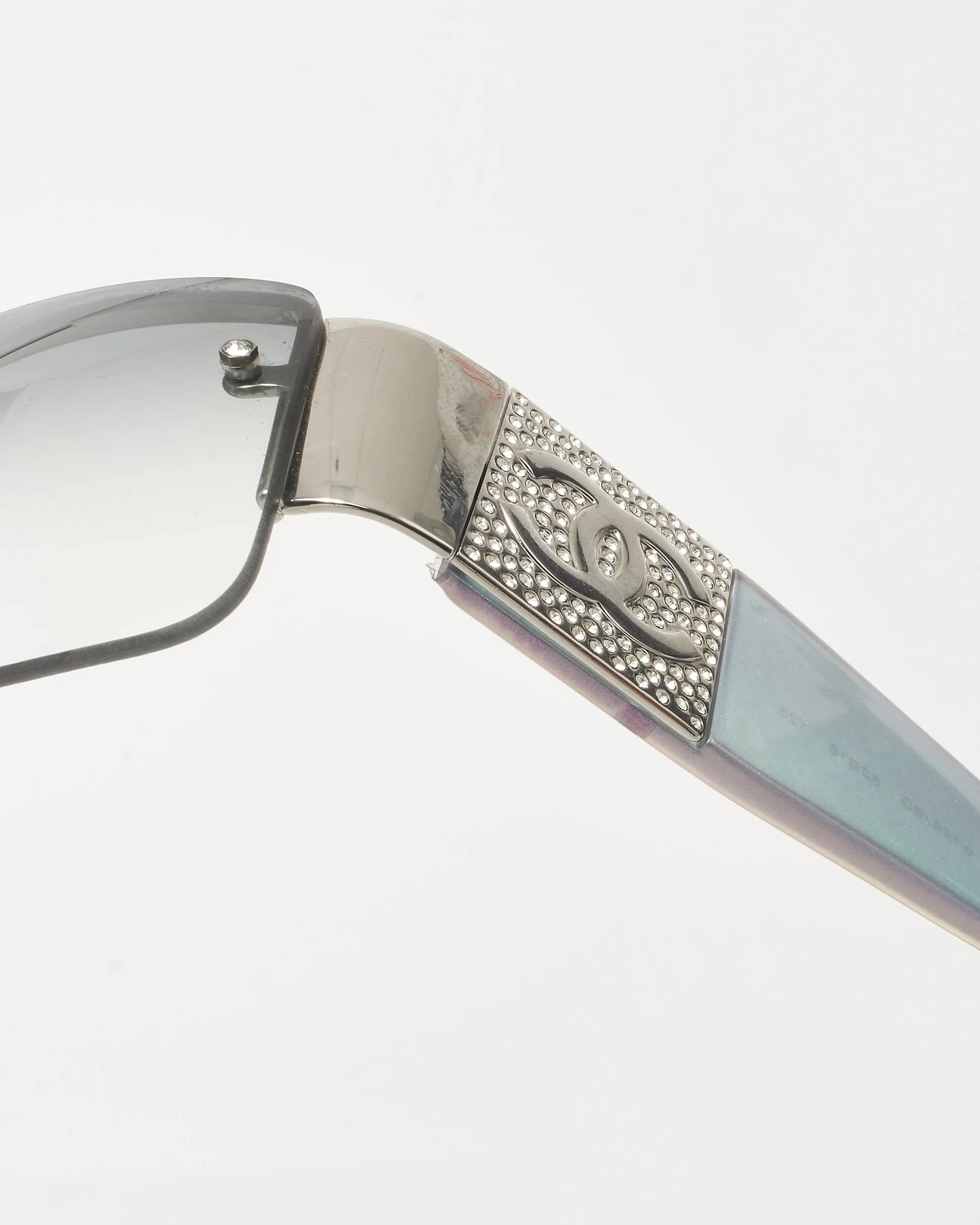 CHANEL clear lense glasses with iridescent arms and sequin logo