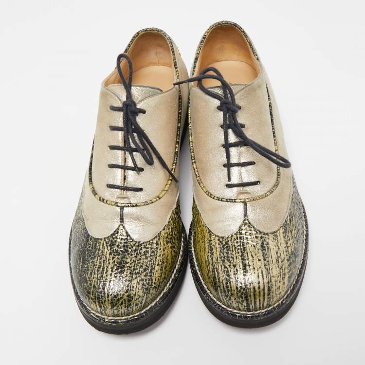 CHANEL womens dress shoe, gold with black pattern toe