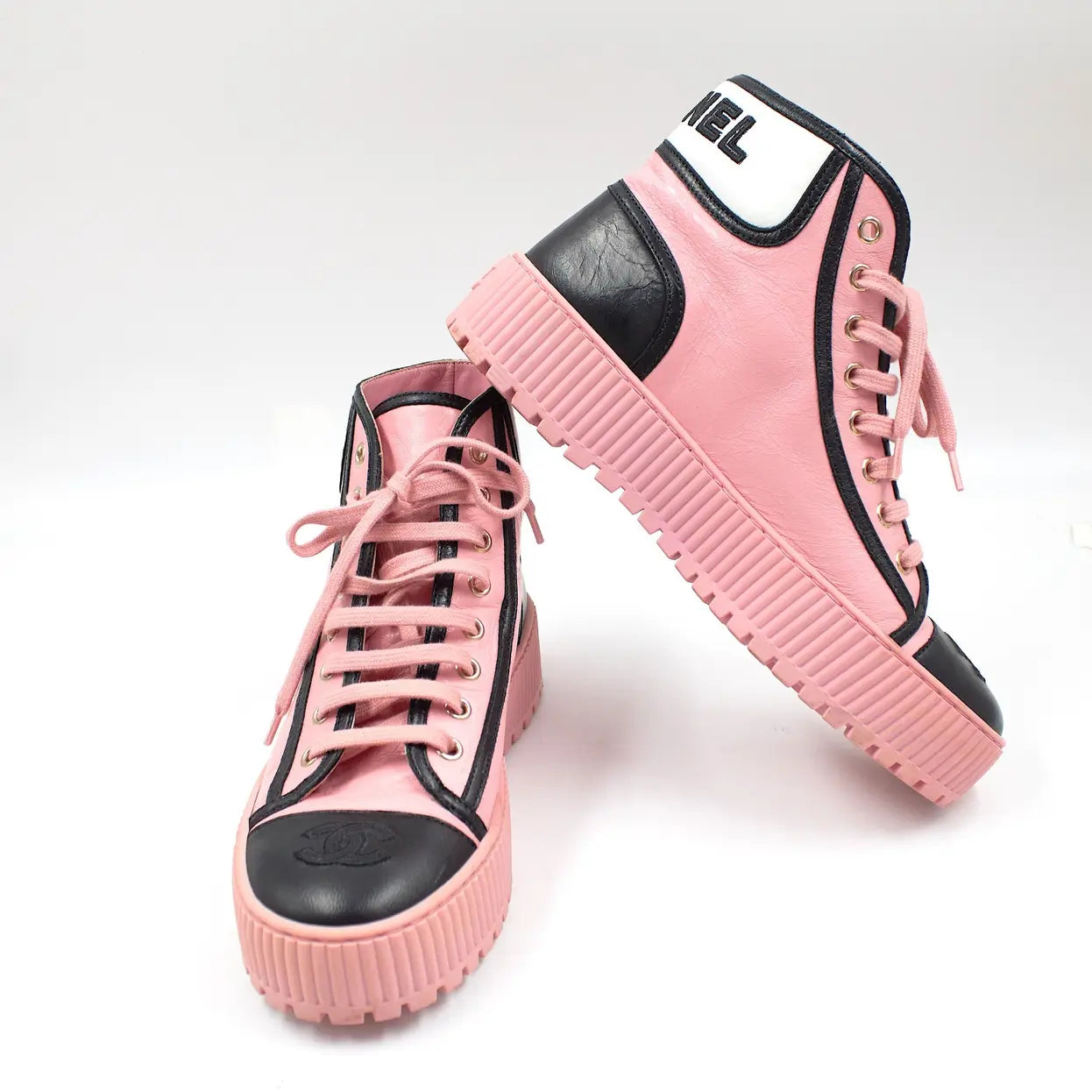 CHANEL pink leather hightop sneakers