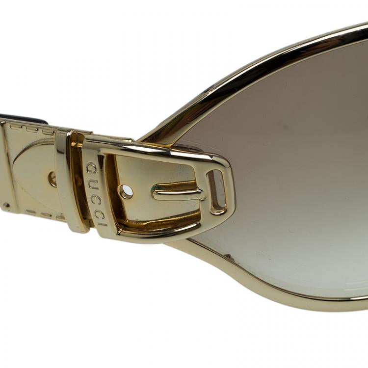 GUCCI large frame sunglesses, gold rim, gold side that looks like belt buckle