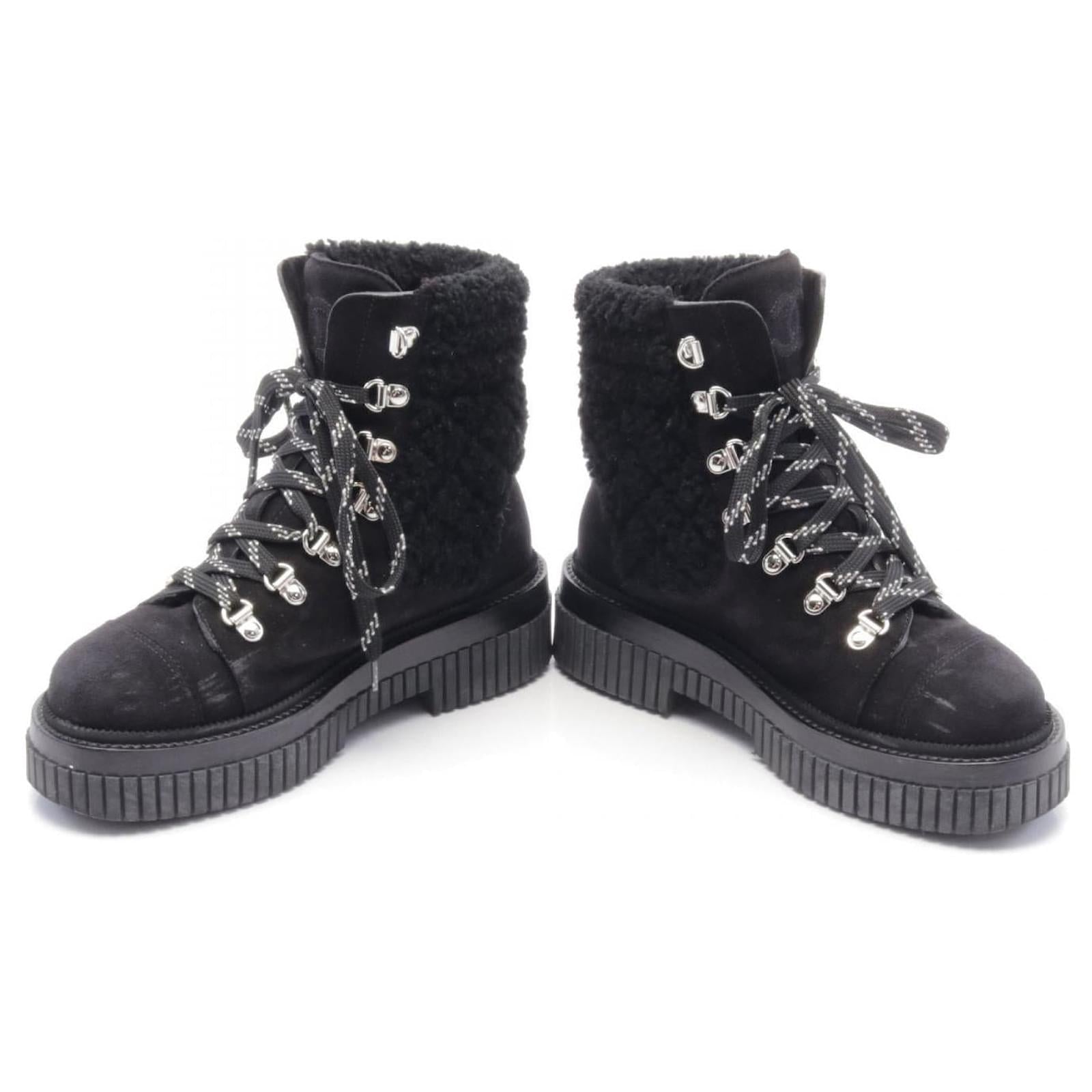 CHANEL black suede boots with black shearling, w dust bags and box