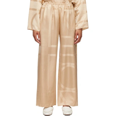 TOTEME monogram silk lounge pants