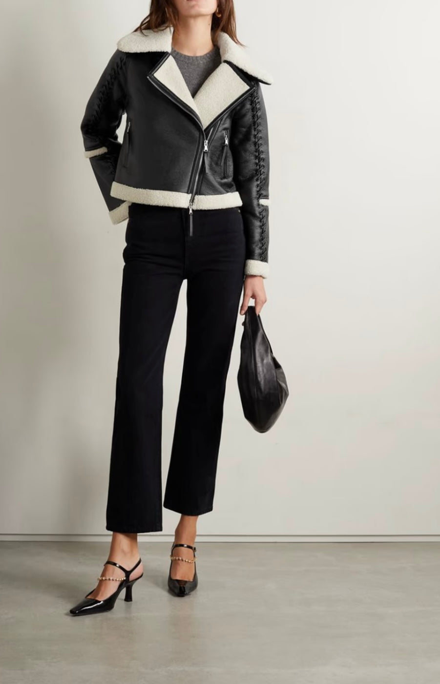 SIMKHAI
Corinne whipstitched faux shearling biker jacket