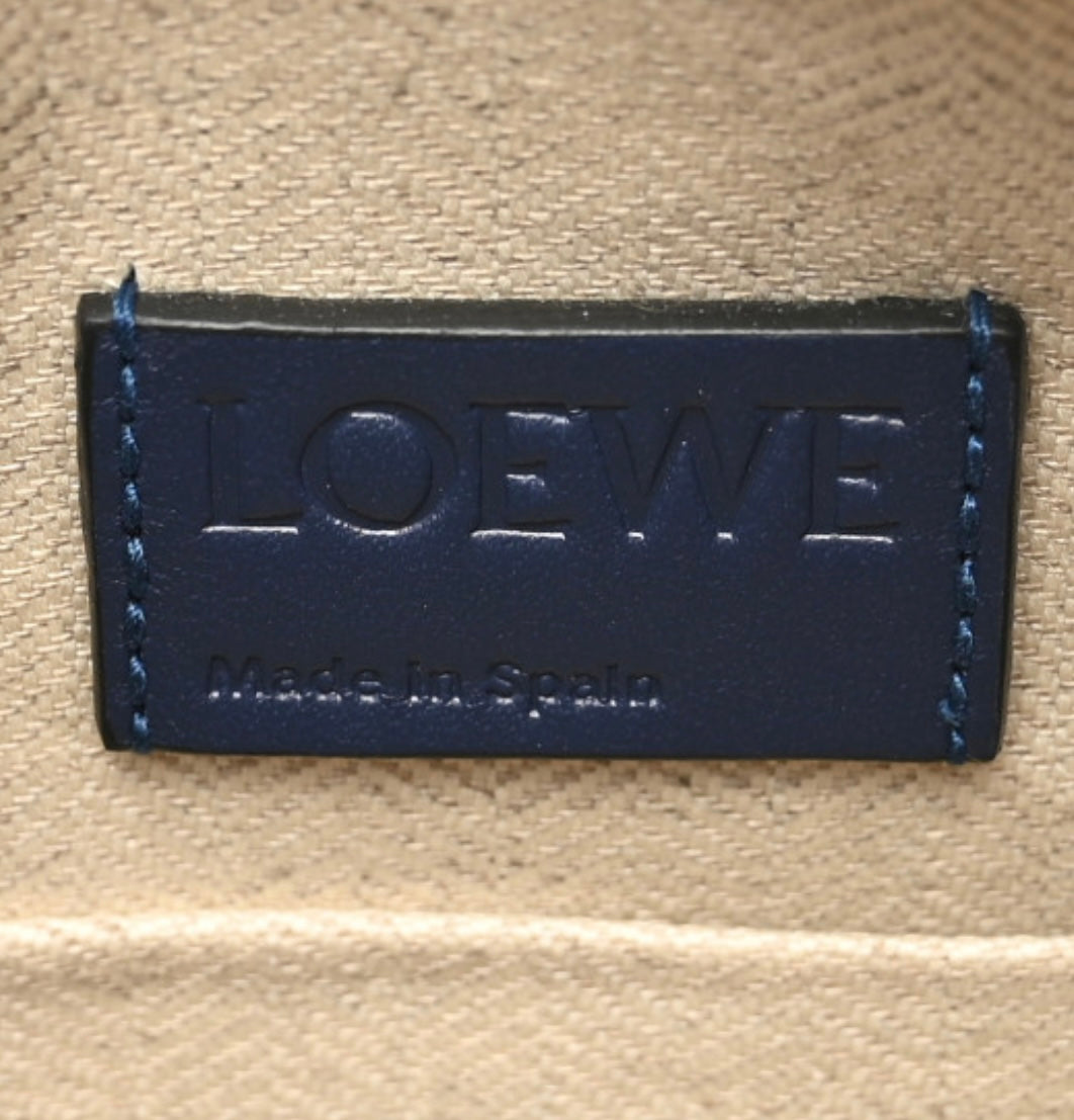 LOEWE
Calfskin Embossed Repeat T Pouch Navy