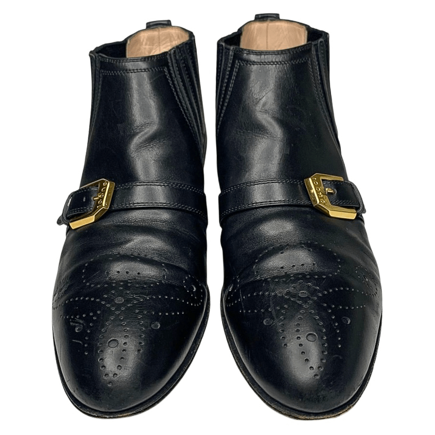 GUCCI black booties with gold buckle