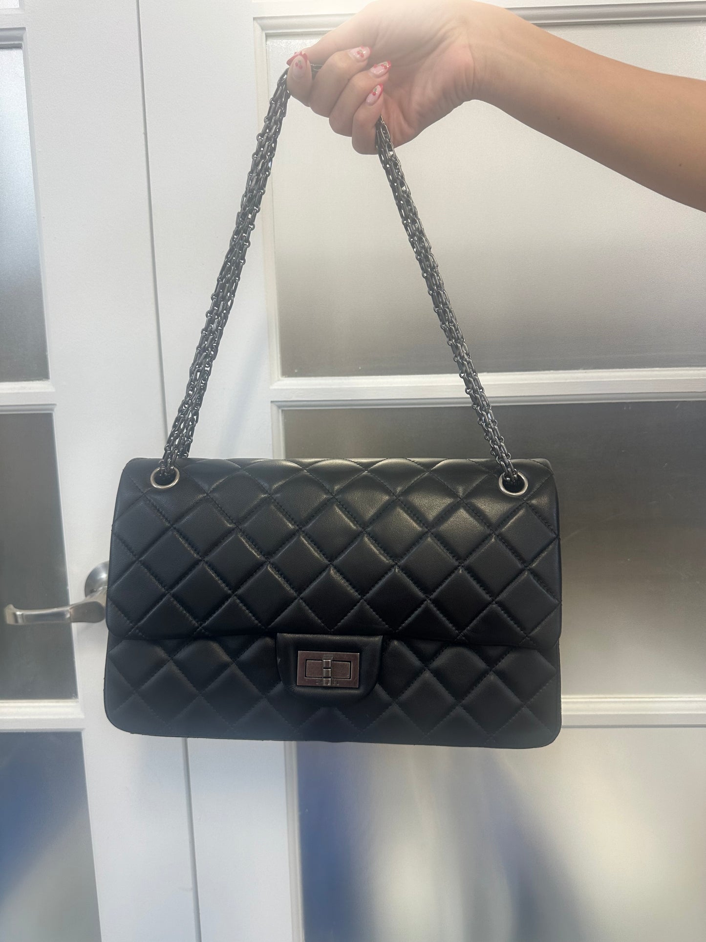 Pre-loved CHANEL - BLACK REISSUE 2.55 CLASSIC DOUBLE FLAP BAG MEDIUM