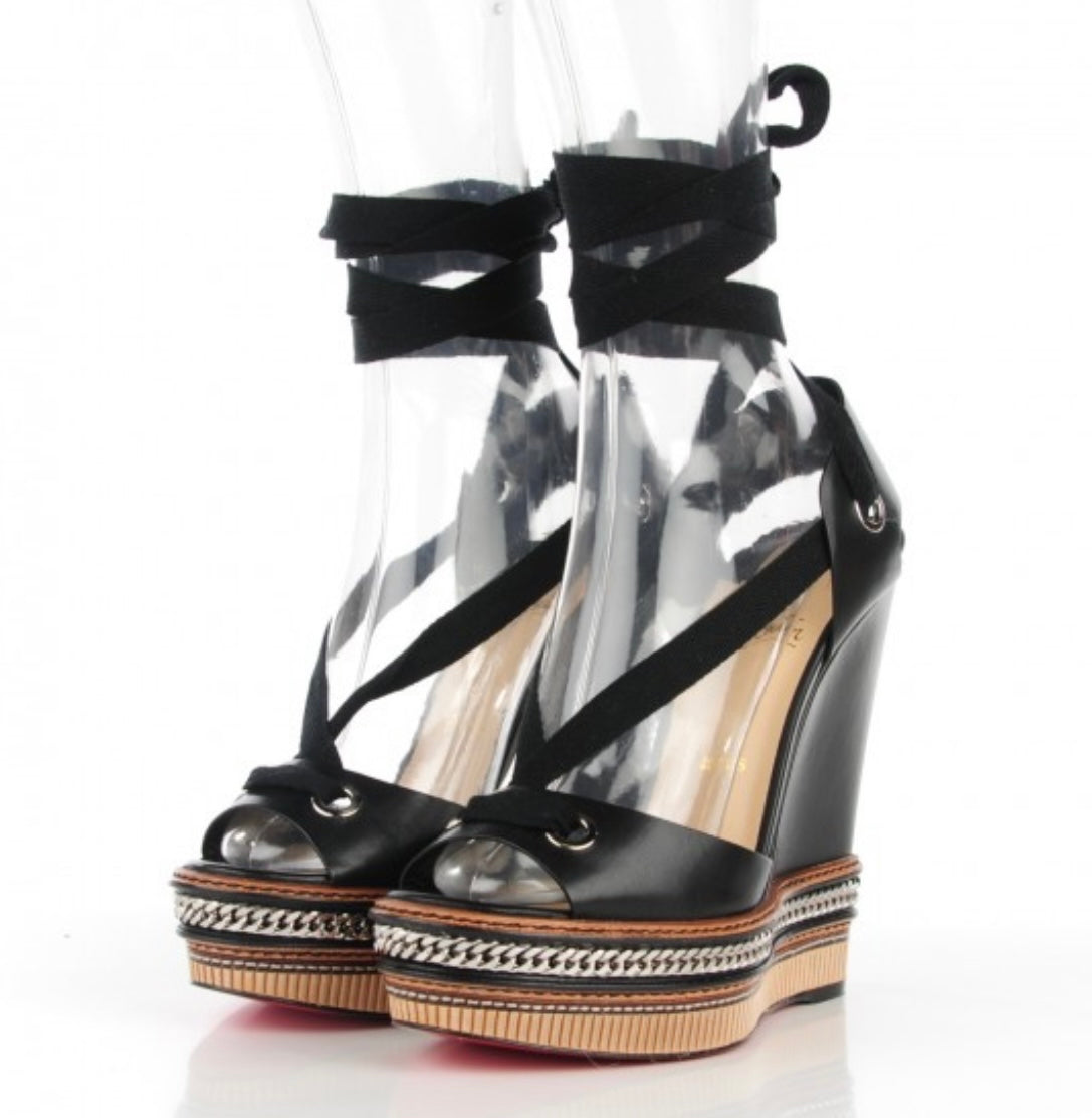 CHRISTIAN LOUBOUTIN
Shiny Calfskin Tribuli 140 Wedge