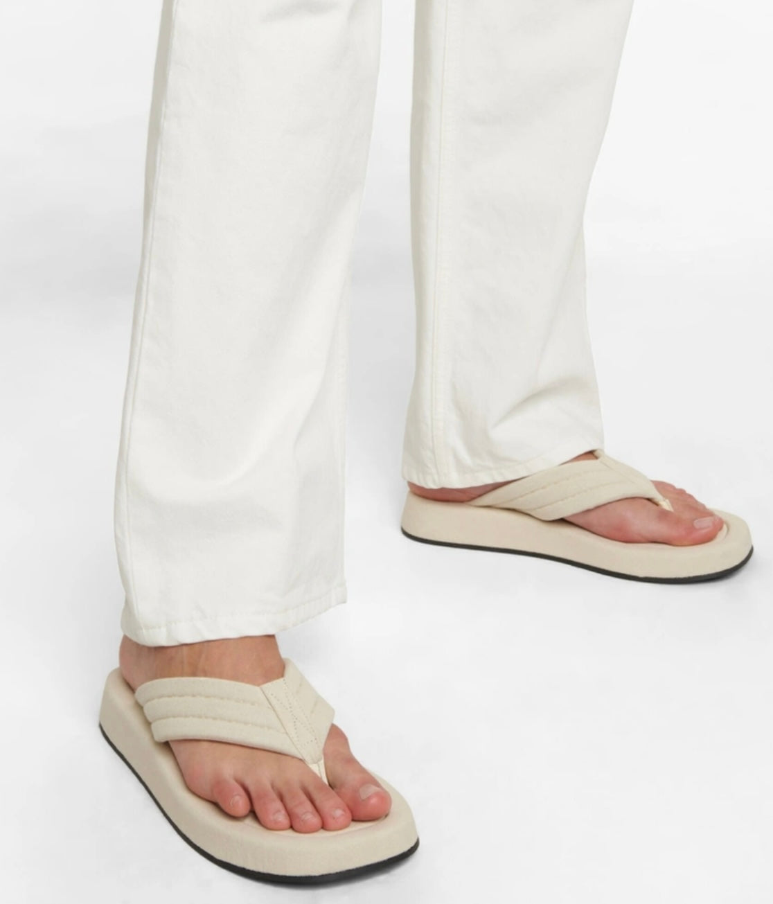 THE ROW GINZA CANVAS FLIP FLOPS IN OAT