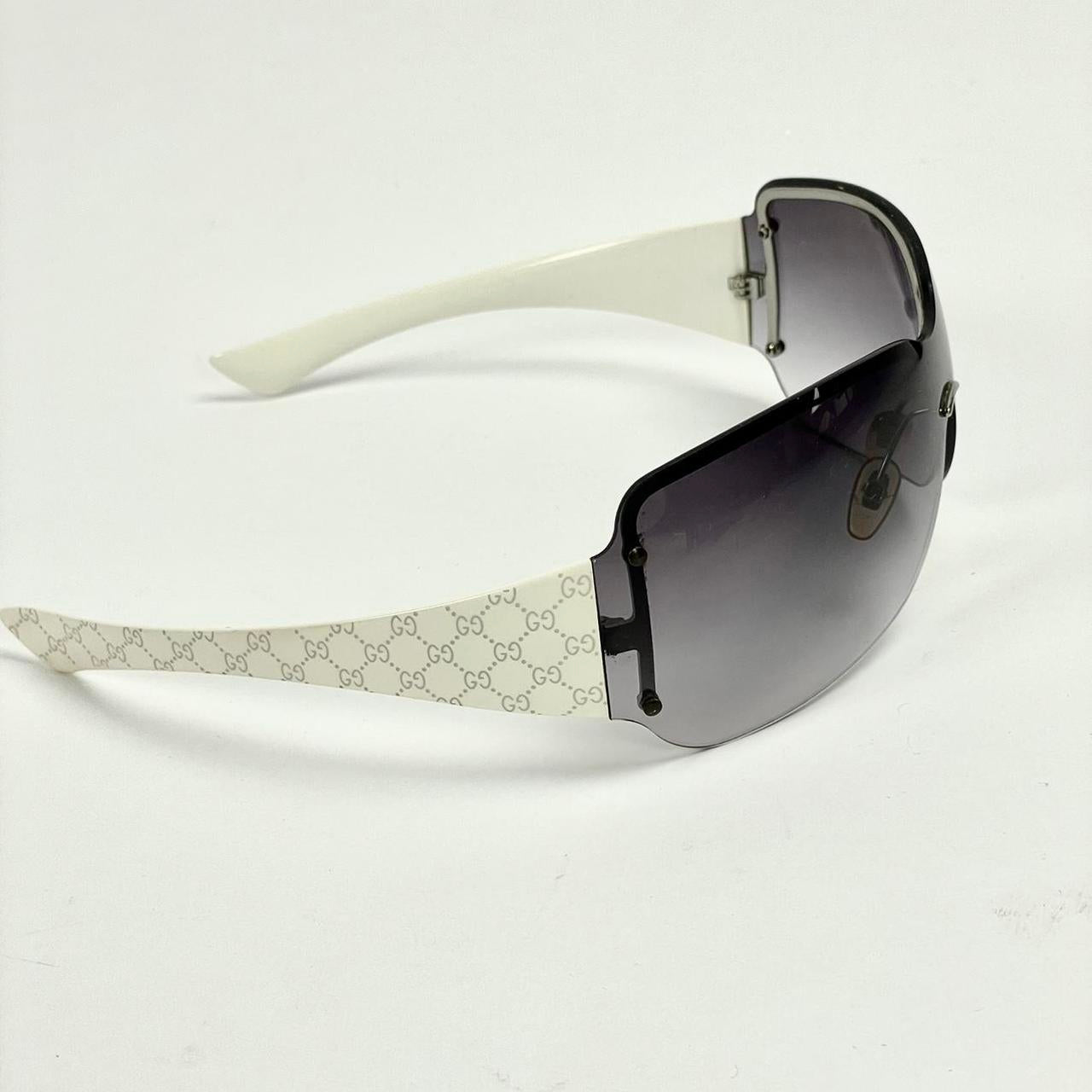 GUCCI sunglasses, no rim, gradient black to clear lense, white arms with GG logo, with case