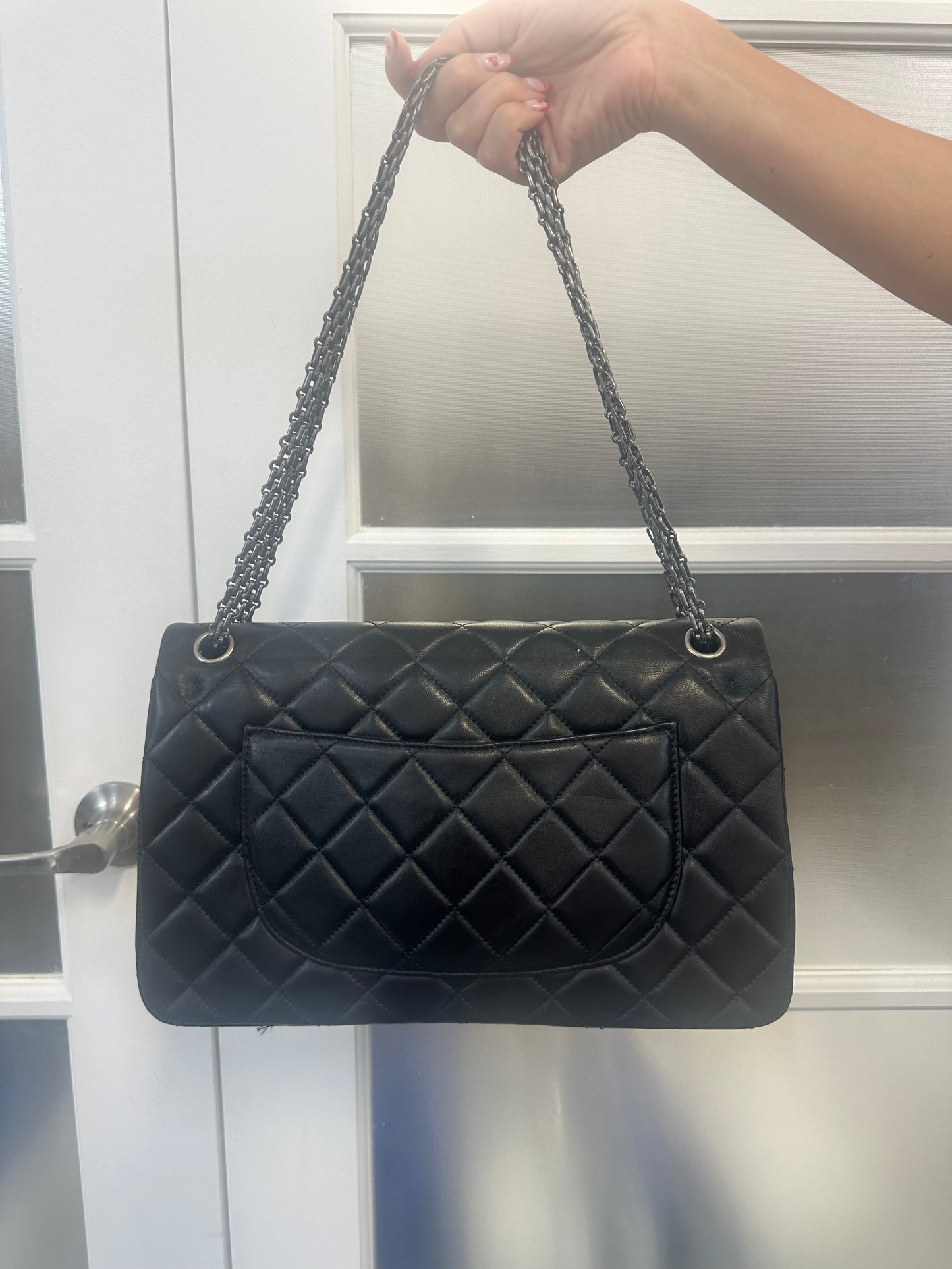 Pre-loved CHANEL - BLACK REISSUE 2.55 CLASSIC DOUBLE FLAP BAG MEDIUM